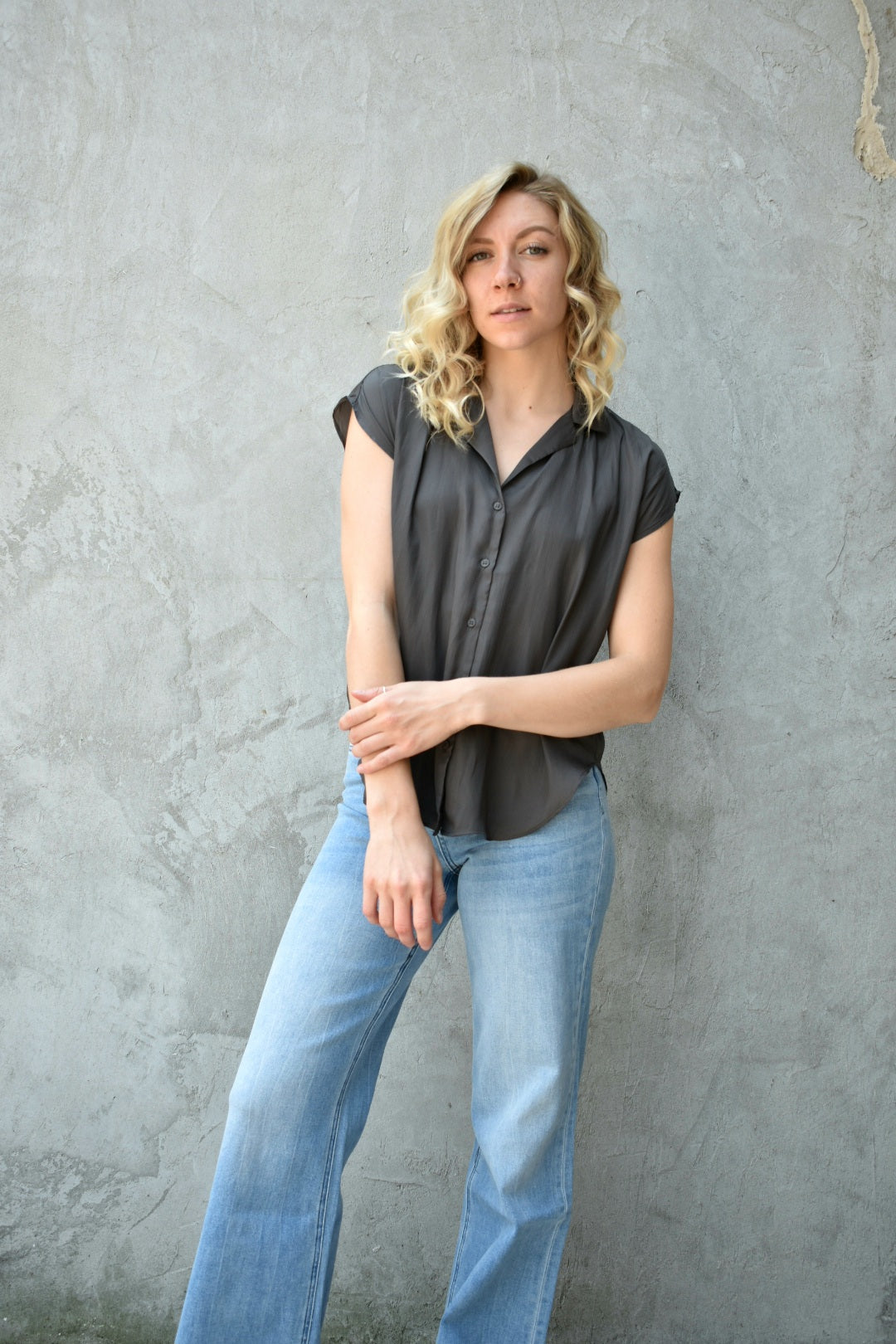 Light weight charcoal button down scooped hemline full length blouse with collar and cap sleeves. Brand is Miou Muse.