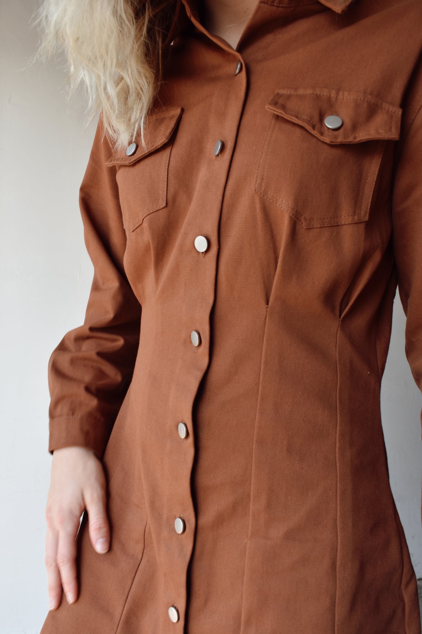 twill rust brown long sleeve utility dress flap breast pockets, collar, button down front and drop shoulders, slightly loose fitting