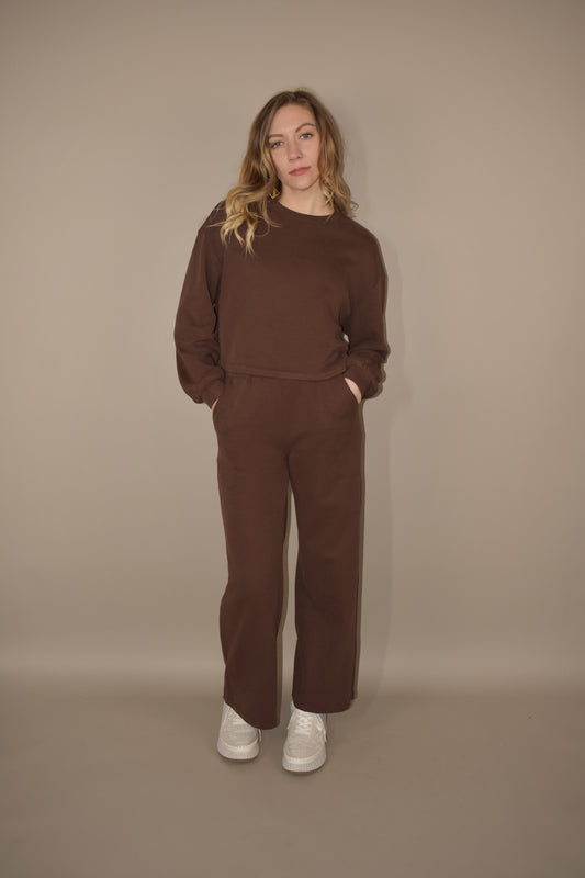 long sleeve crewneck and wide leg lounge set. pants have stretch band at waist and front pockets. relaxed fit.