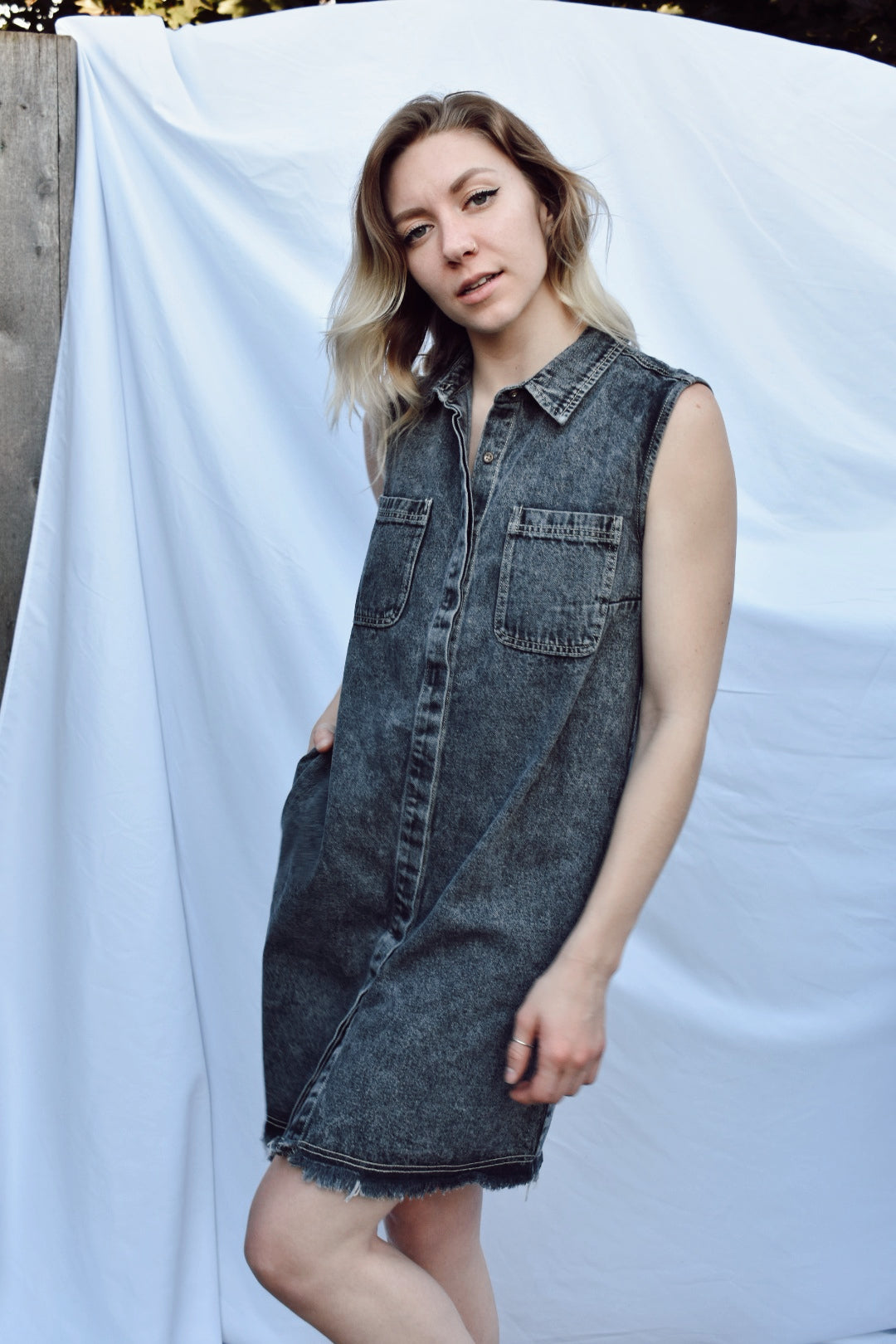 acid wash denim and raw edge frayed hem mini dress button down collar with pockets Bluivy the revival