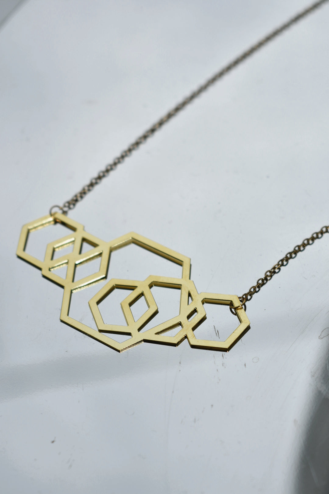 graduated hexagon laser cut brass pendant necklace 18" gold