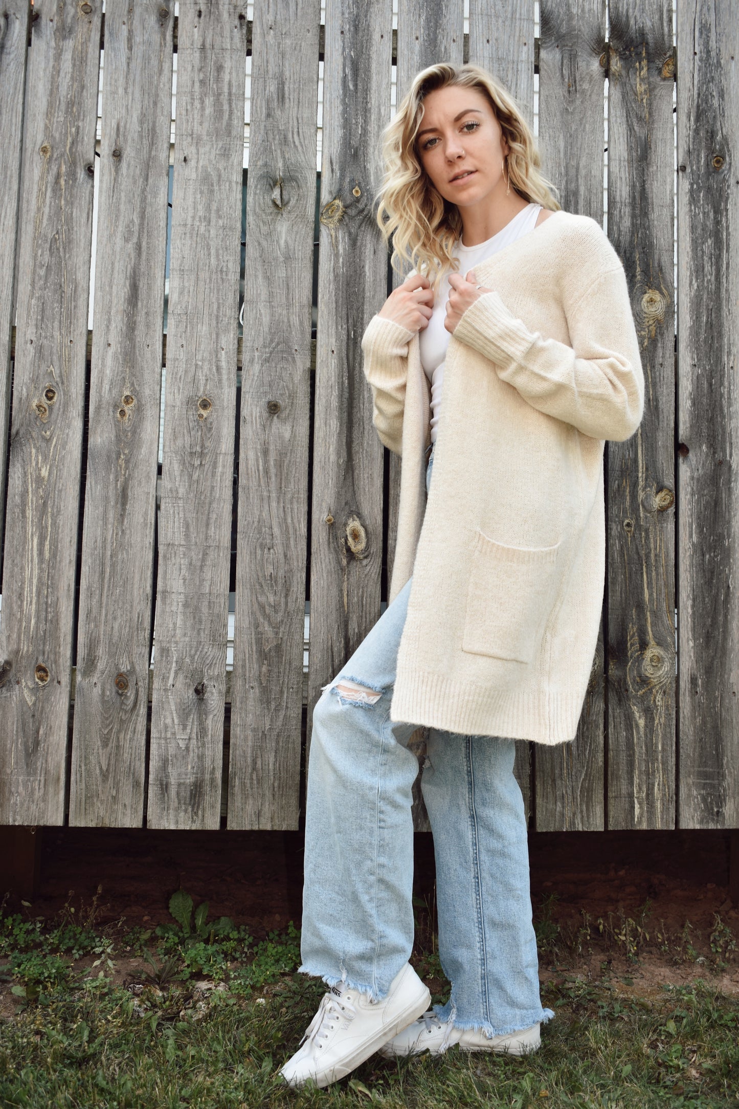 Open front knit cardigan in a natural color hits just above the knees and has two front patch pockets super cozy
