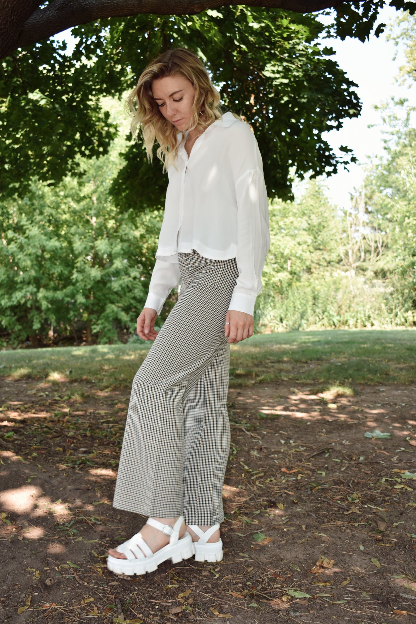 Black tan and white plaid wide leg pants with oversized front patch pockets high waisted with back pockets and a stretch fit.