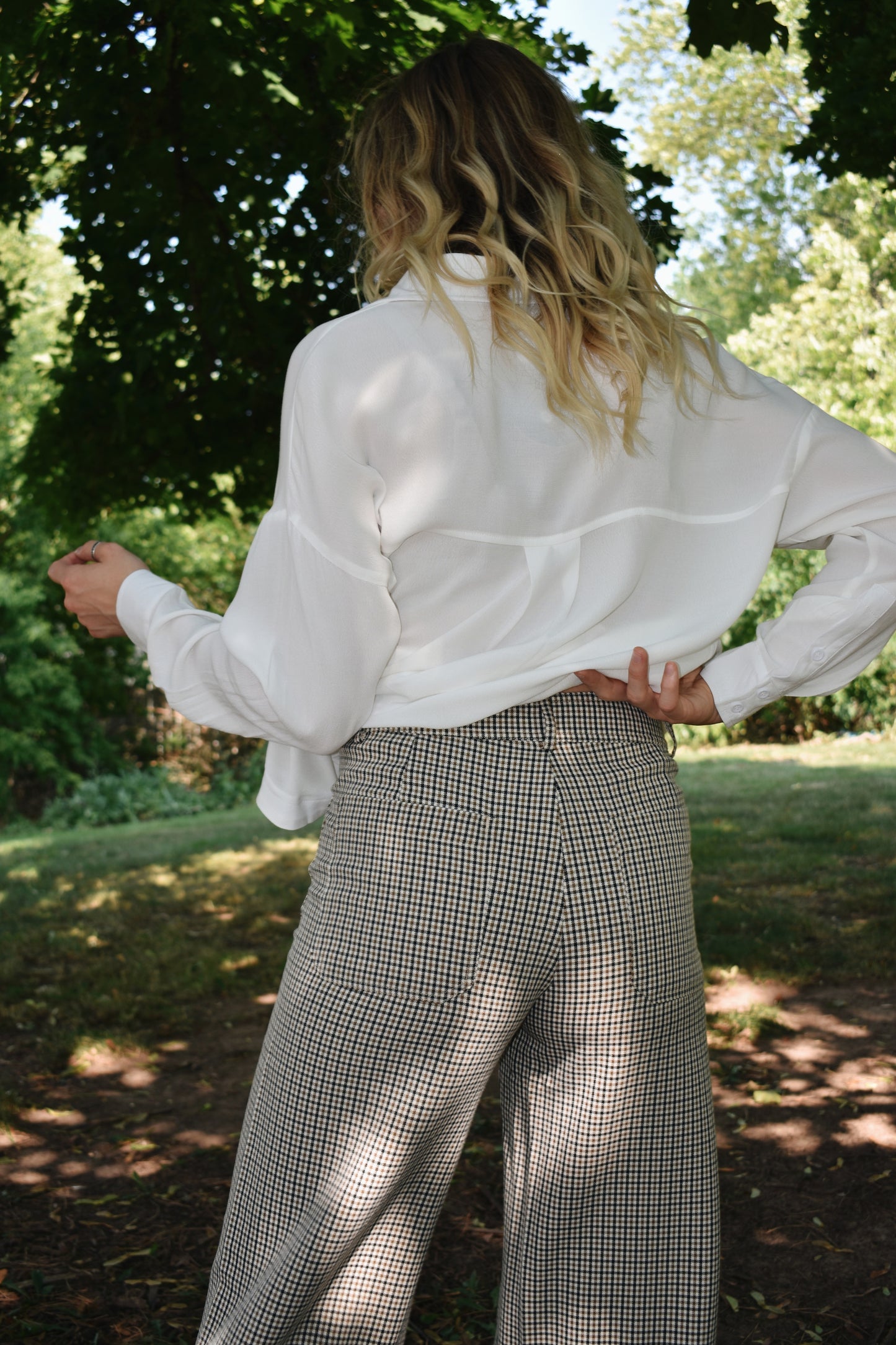 Black tan and white plaid wide leg pants with oversized front patch pockets high waisted with back pockets and a stretch fit.