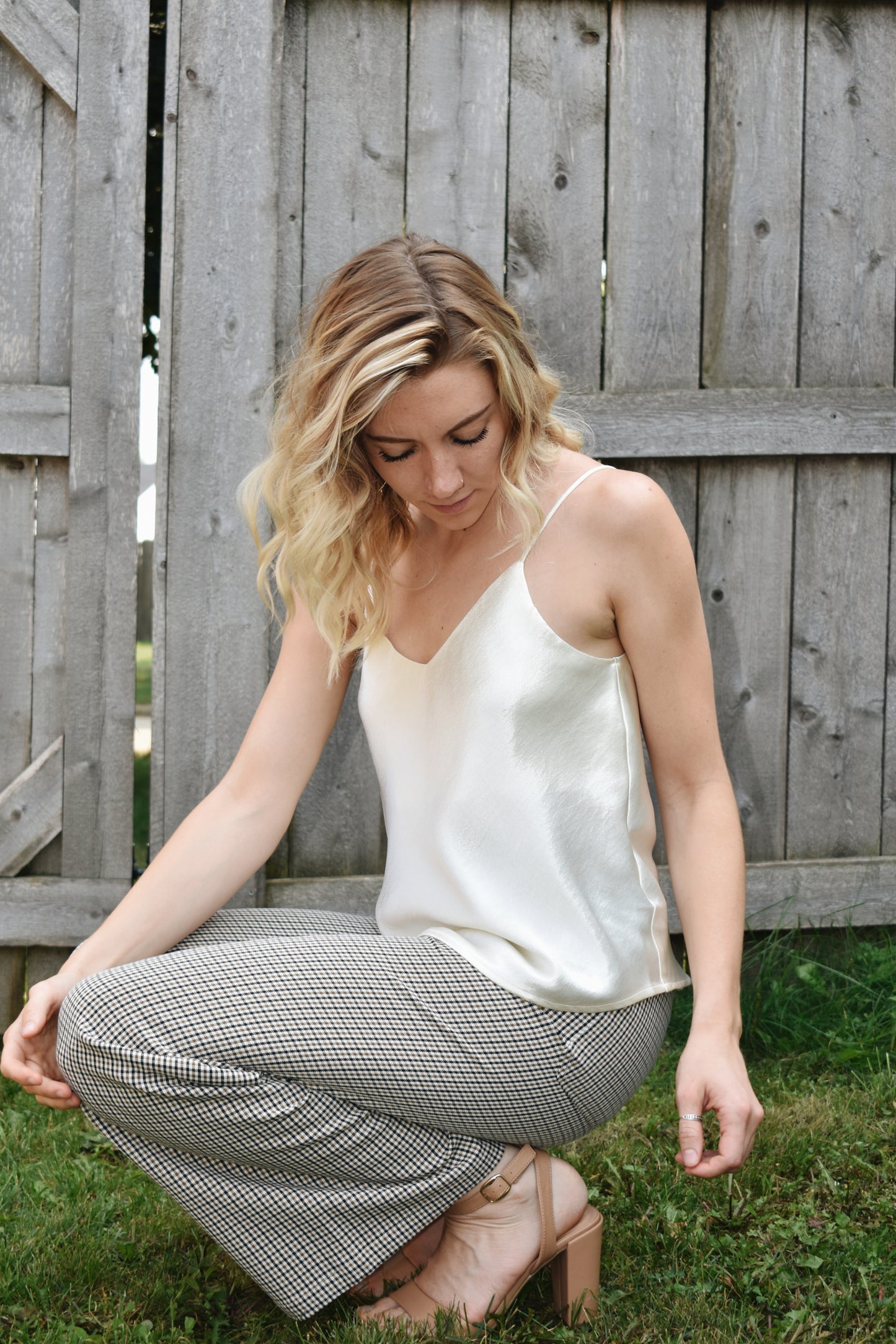 Ivory metallic sheen full length cami with adjustable spaghetti straps and a V neckline in the front and in the back