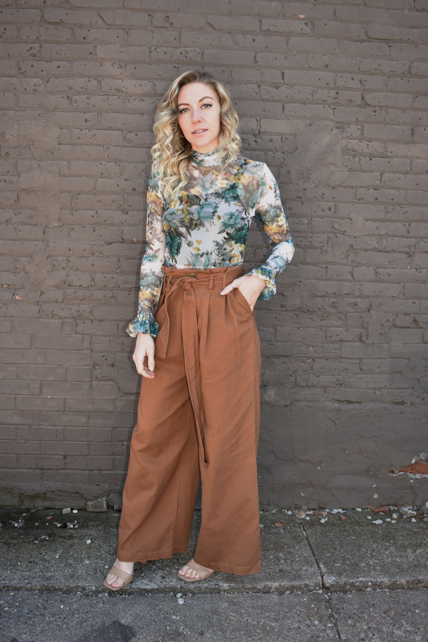 Light brown high waisted twill pants with wide legs, tie belt, side pockets, paper bag style on waistline