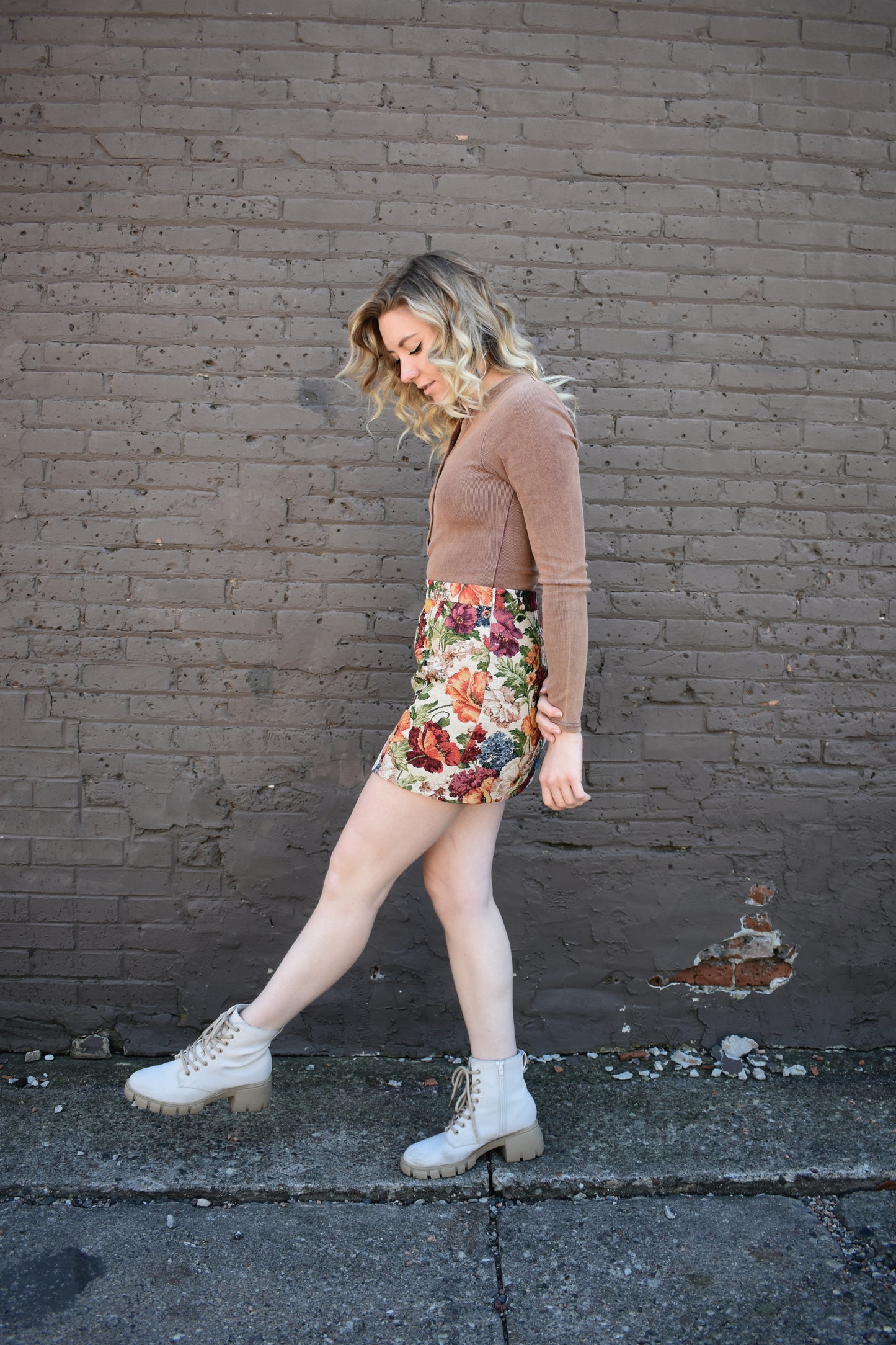 multicolored floral tapestry mini skirt. retro style. taupe background.