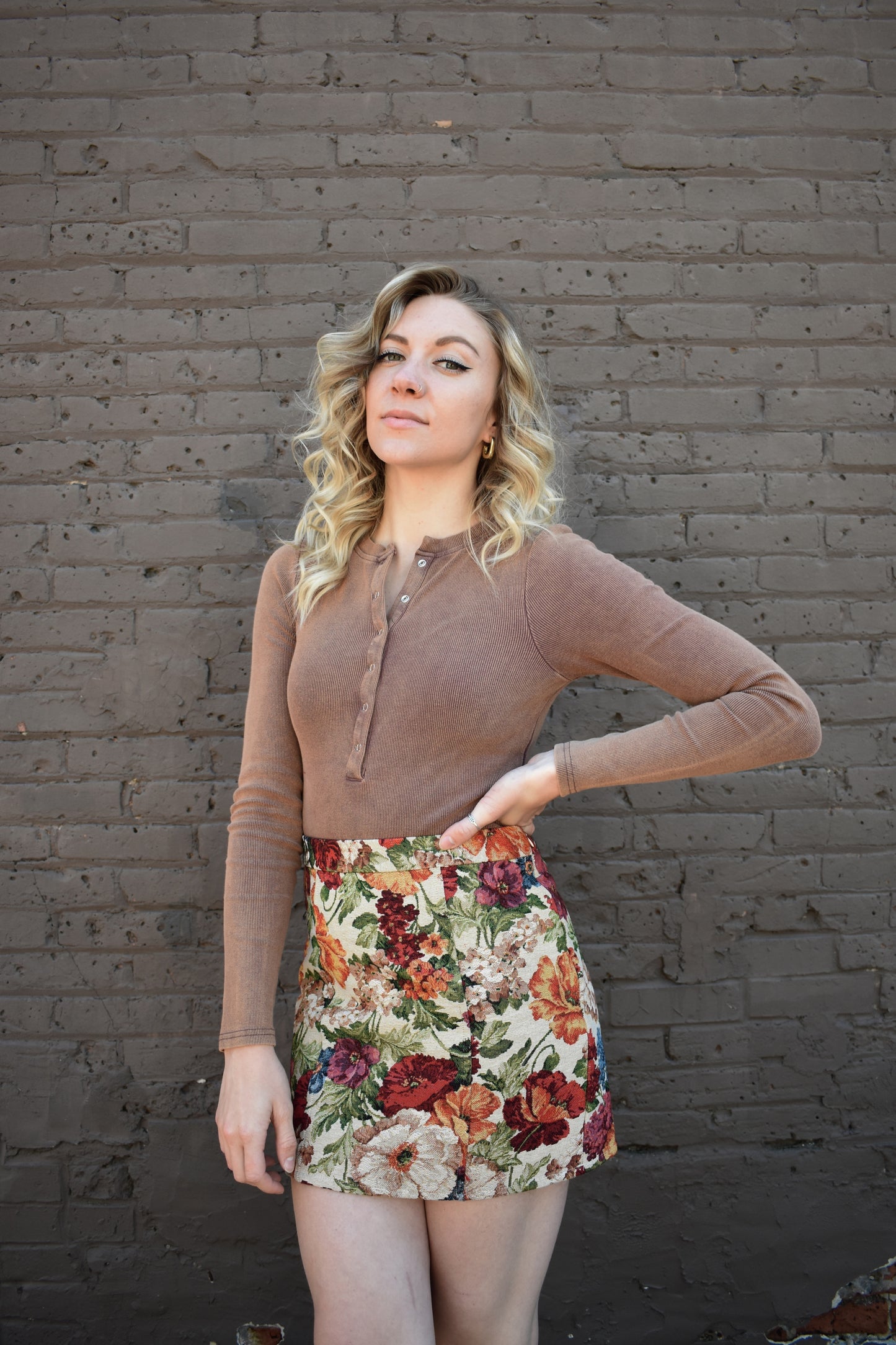 multicolored floral tapestry mini skirt. retro style. taupe background.