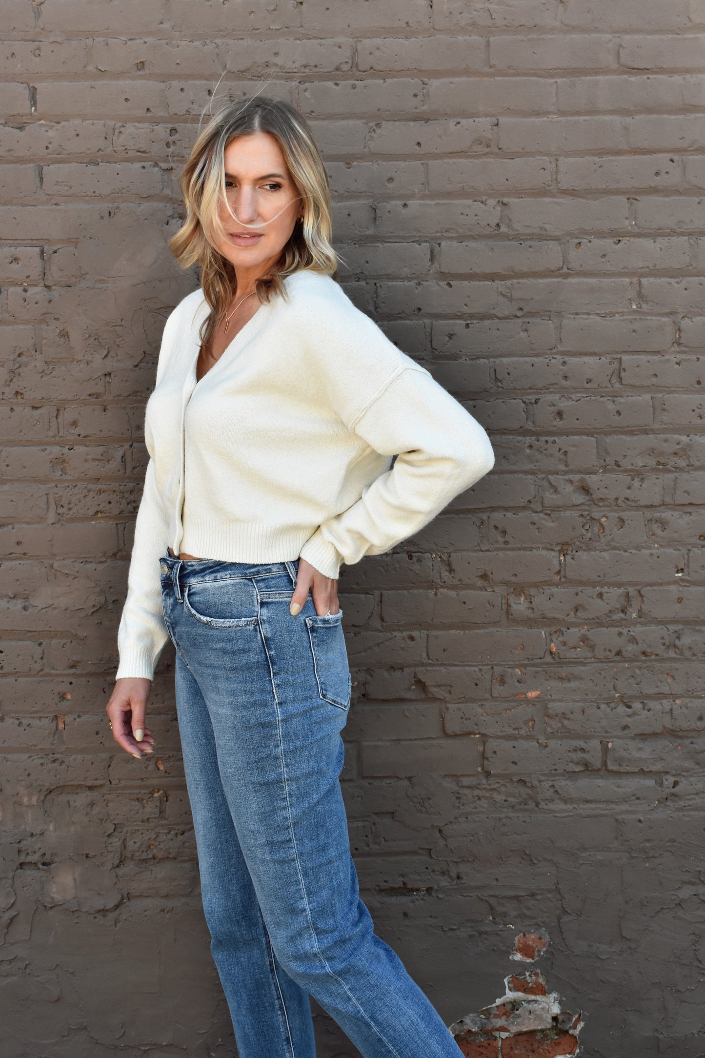 cropped v neck button front drop shoulder cardigan with ribbed cuffs and hem