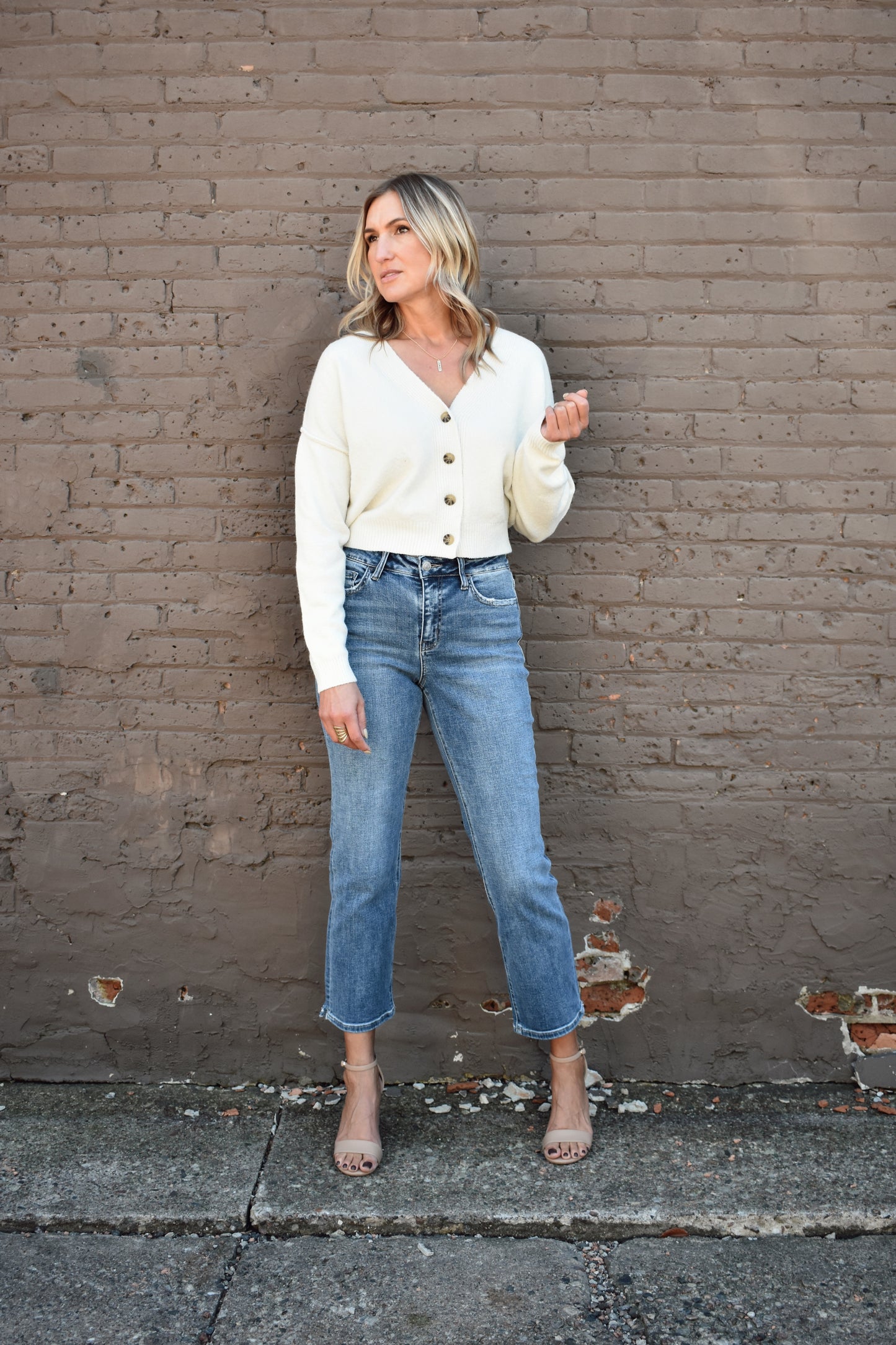 cropped v neck button front drop shoulder cardigan with ribbed cuffs and hem