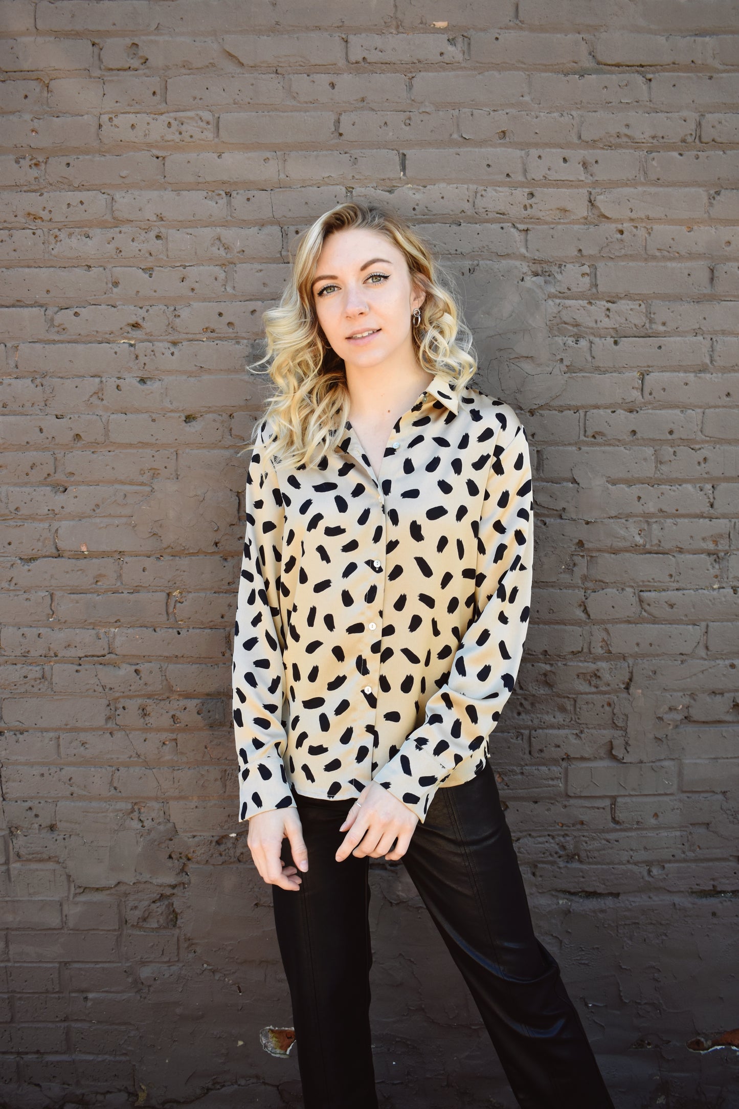 taupe and black brush stroke pattern on a satin long sleeve button down blouse. Full length, button cuffs, crisp collar.