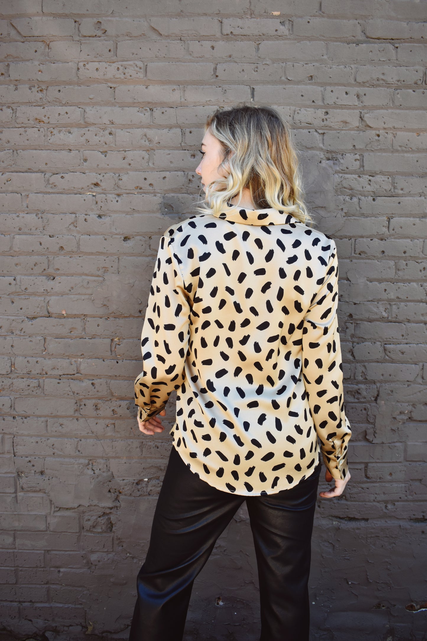 taupe and black brush stroke pattern on a satin long sleeve button down blouse. Full length, button cuffs, crisp collar.