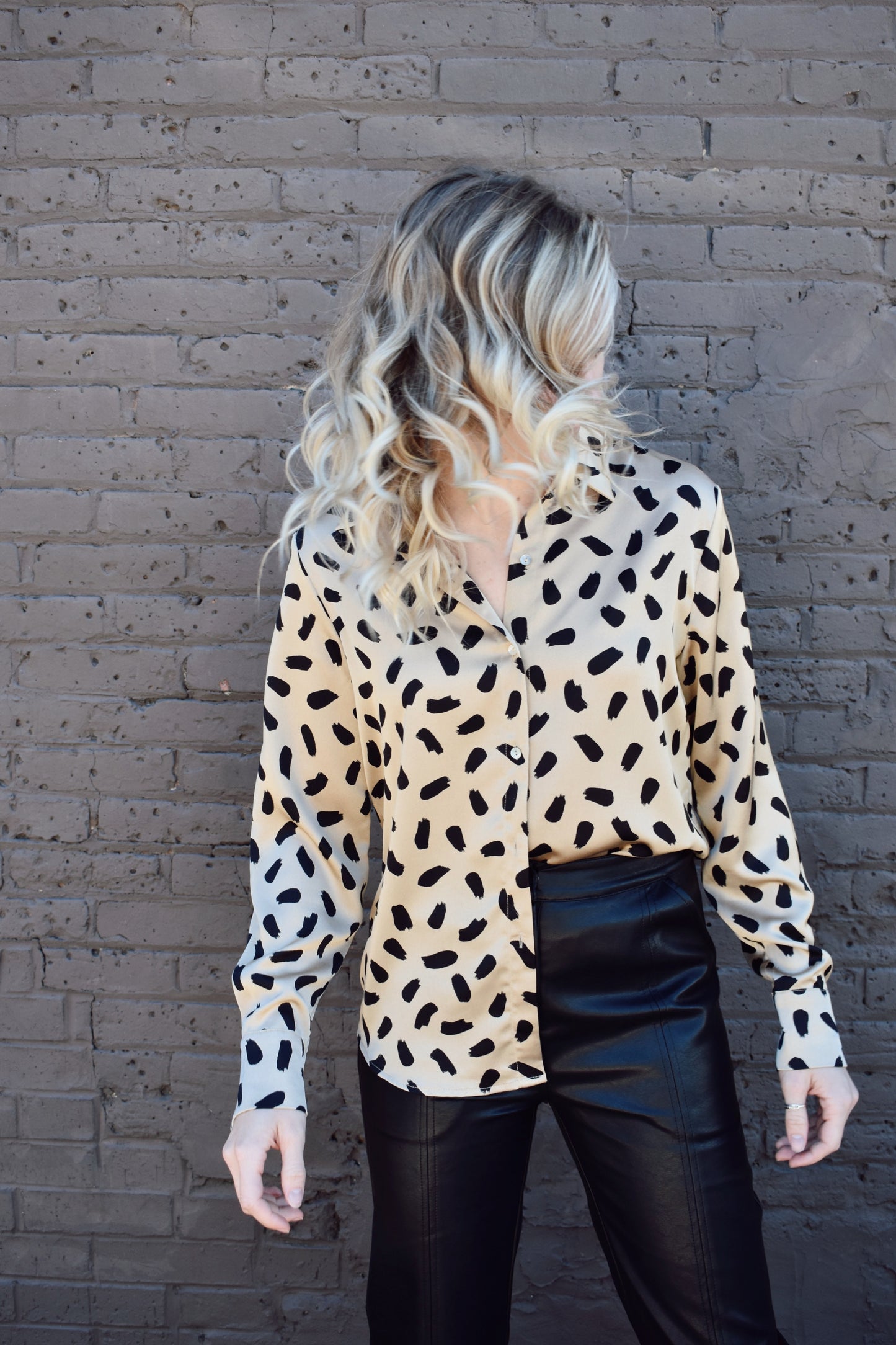 taupe and black brush stroke pattern on a satin long sleeve button down blouse. Full length, button cuffs, crisp collar.