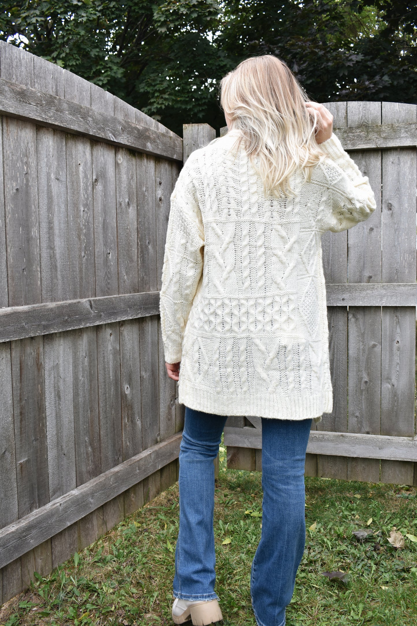 ivory cardigan with mix knit pattern and ribbed cuffs tunic length