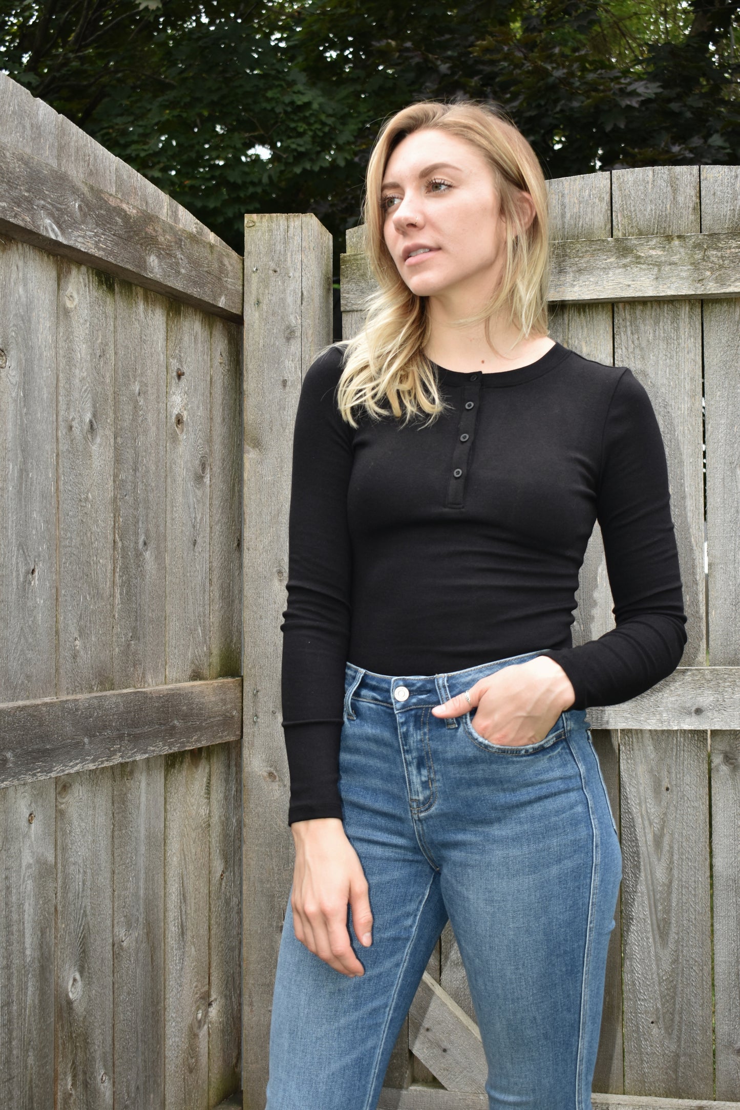fitted full length long sleeve henley with four buttons on the front crew neck stretchy