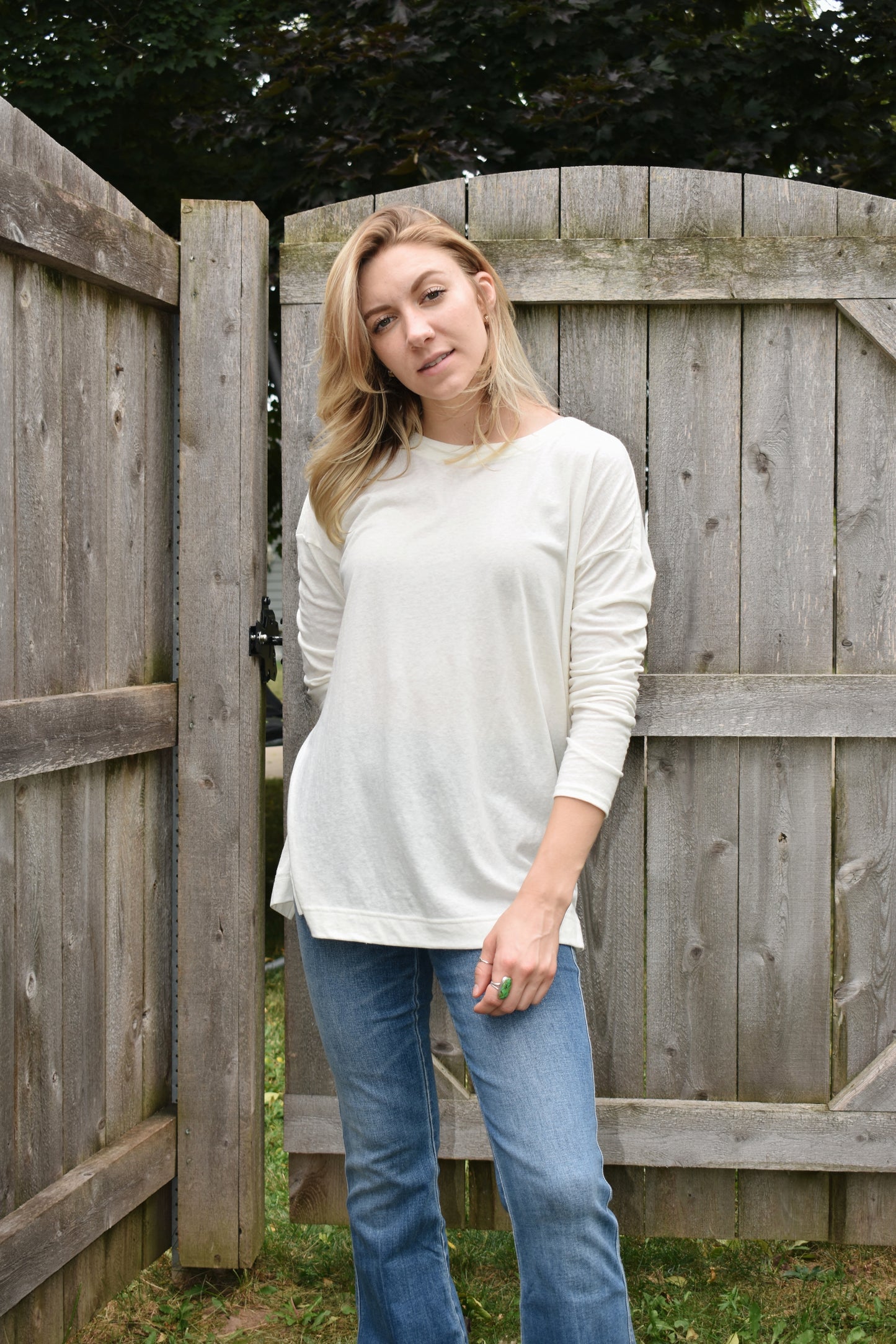 long sleeve loose fitting top with drop shoulders, round neck and splits on the hem on the sides