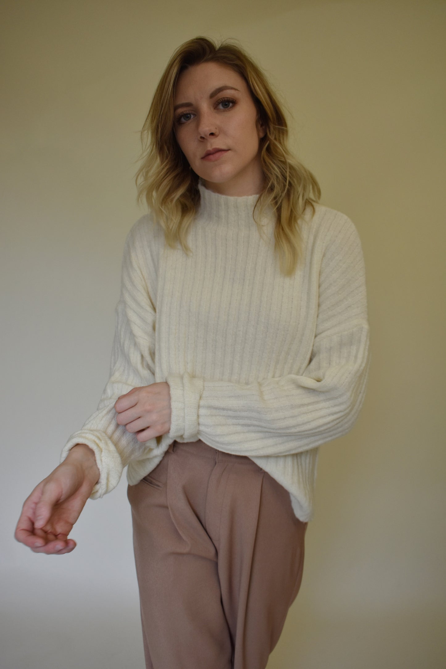 slightly oversized ribbed sweater with mock neck and drop shoulders