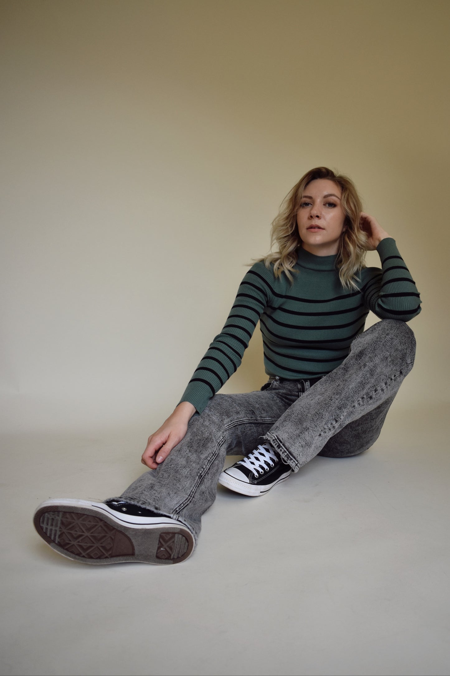 flared stretch denim jeans with gray and black acid wash high rise