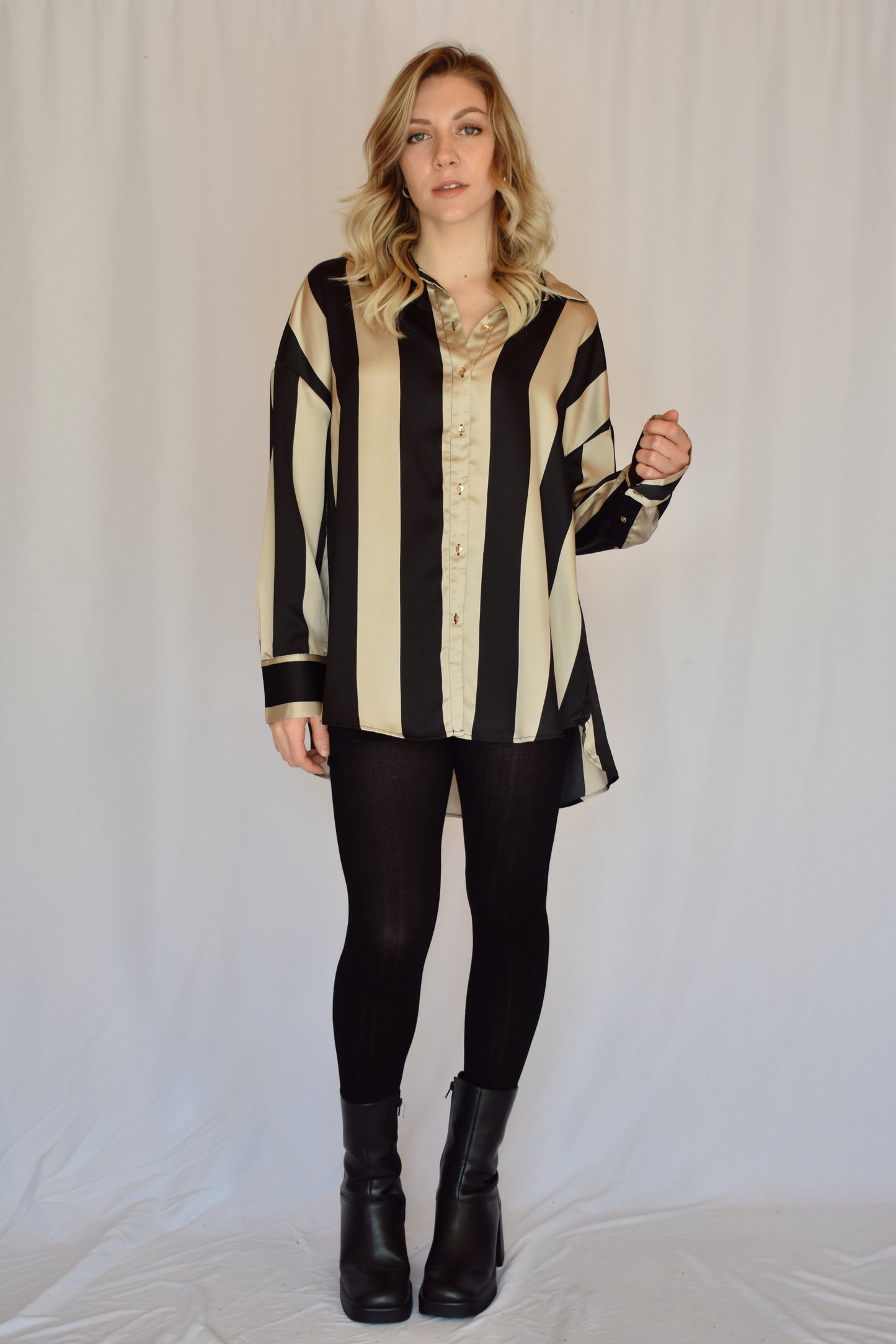 black and light tan striped satin button down slightly oversized button cuffs drop shoulders high low hem