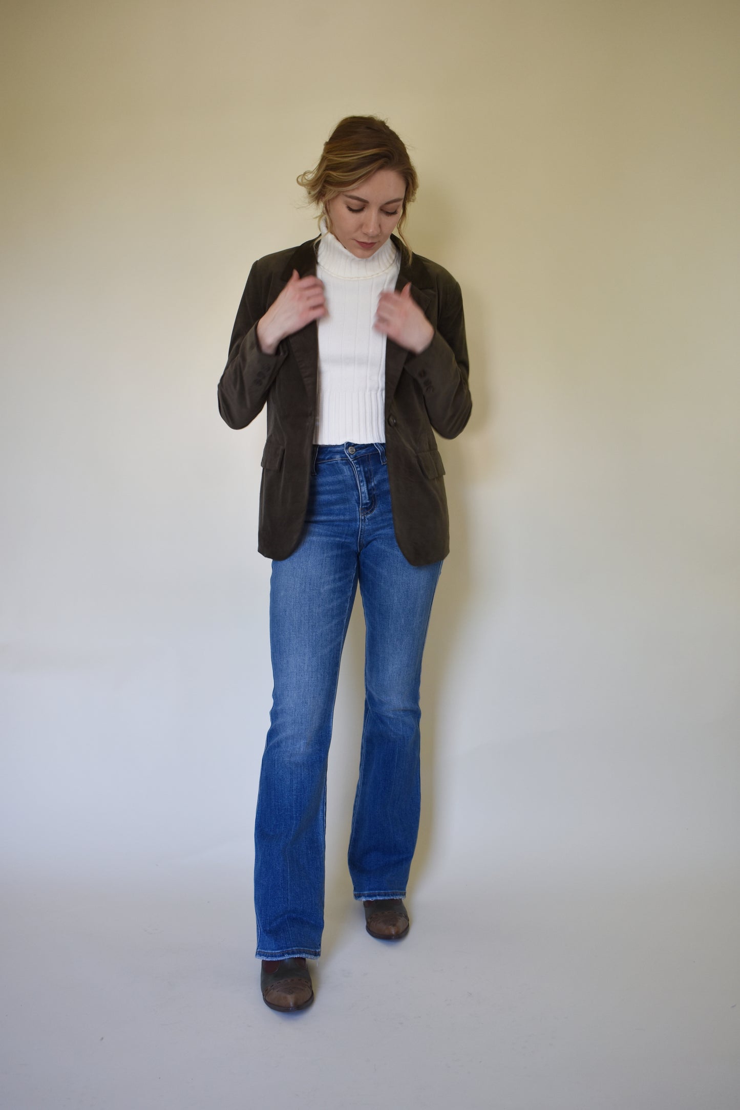 Corduroy dark olive blazer with front flap pockets. one button front closure. Straight fit.