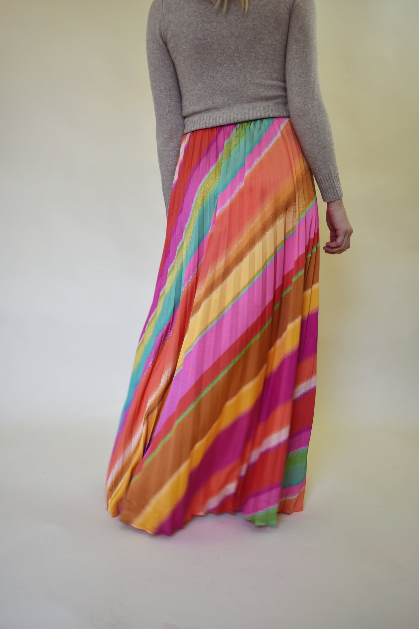 diagonal rainbow pleated satin maxi skirt with waist band and zip enclosure