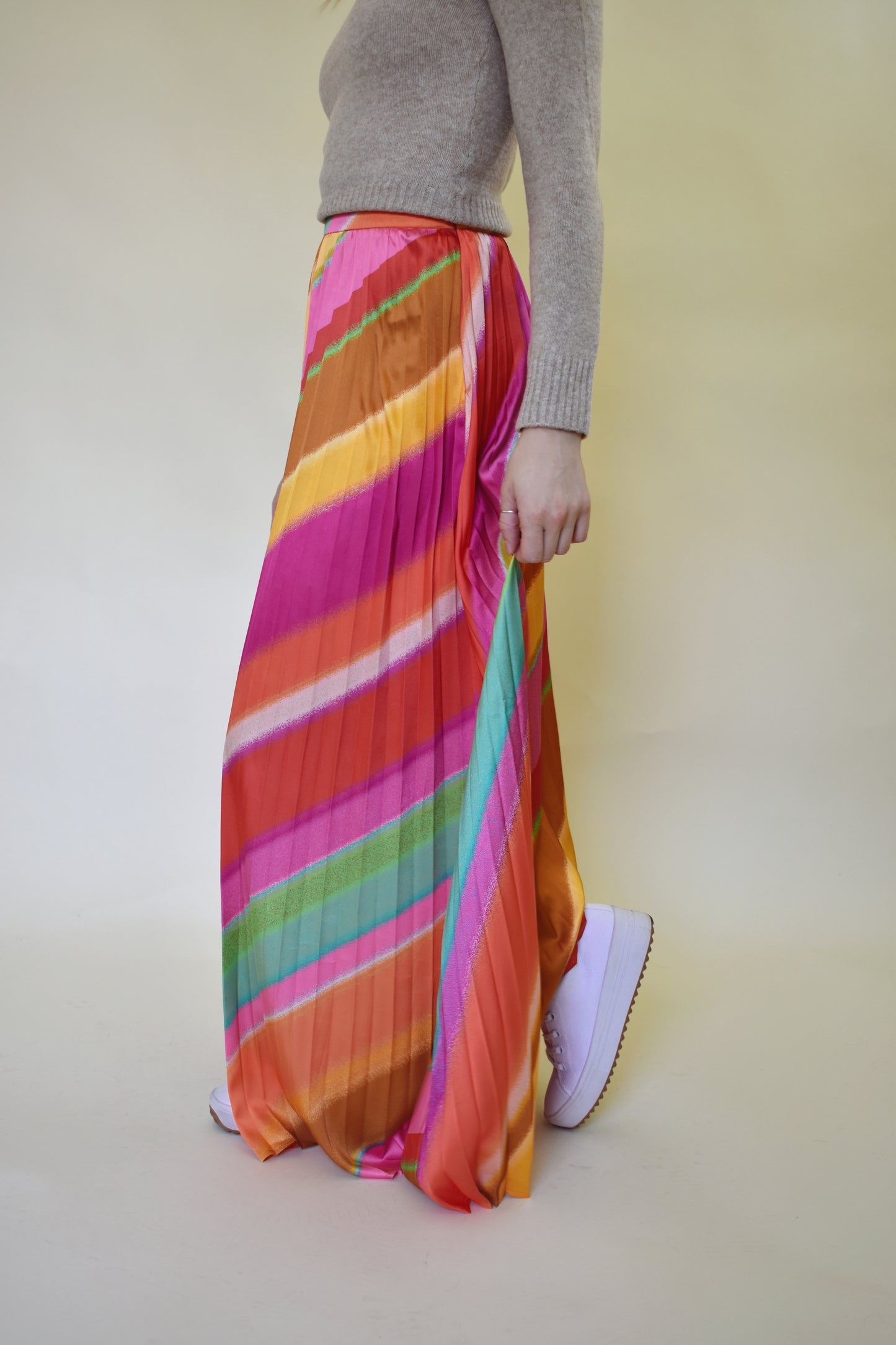 diagonal rainbow pleated satin maxi skirt with waist band and zip enclosure