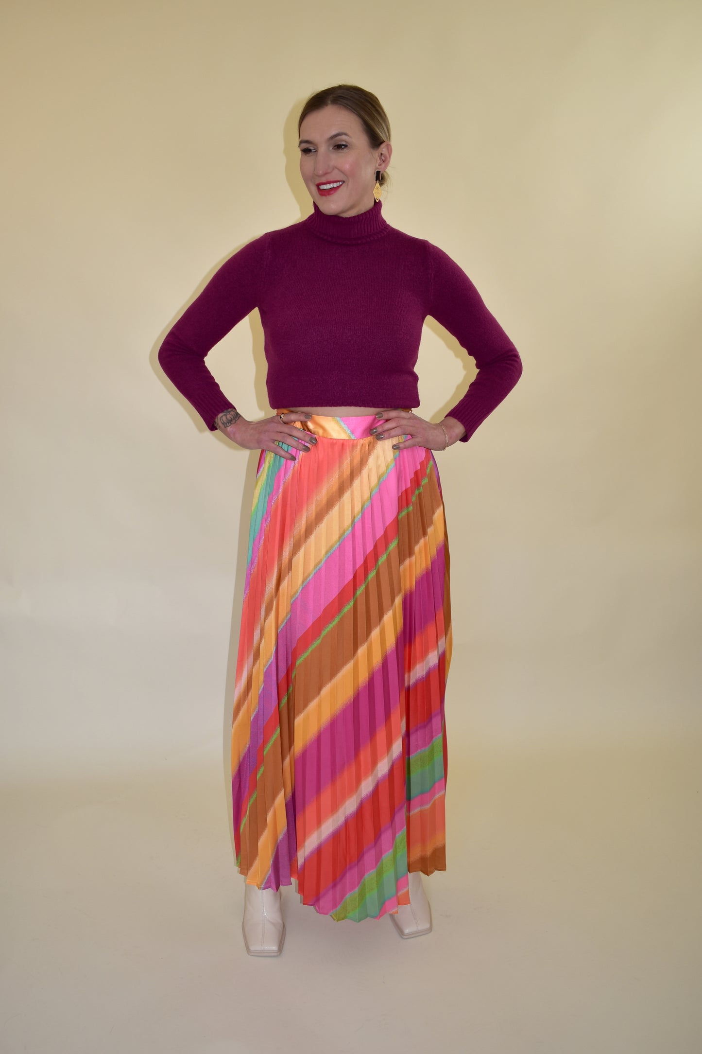 diagonal rainbow pleated satin maxi skirt with waist band and zip enclosure