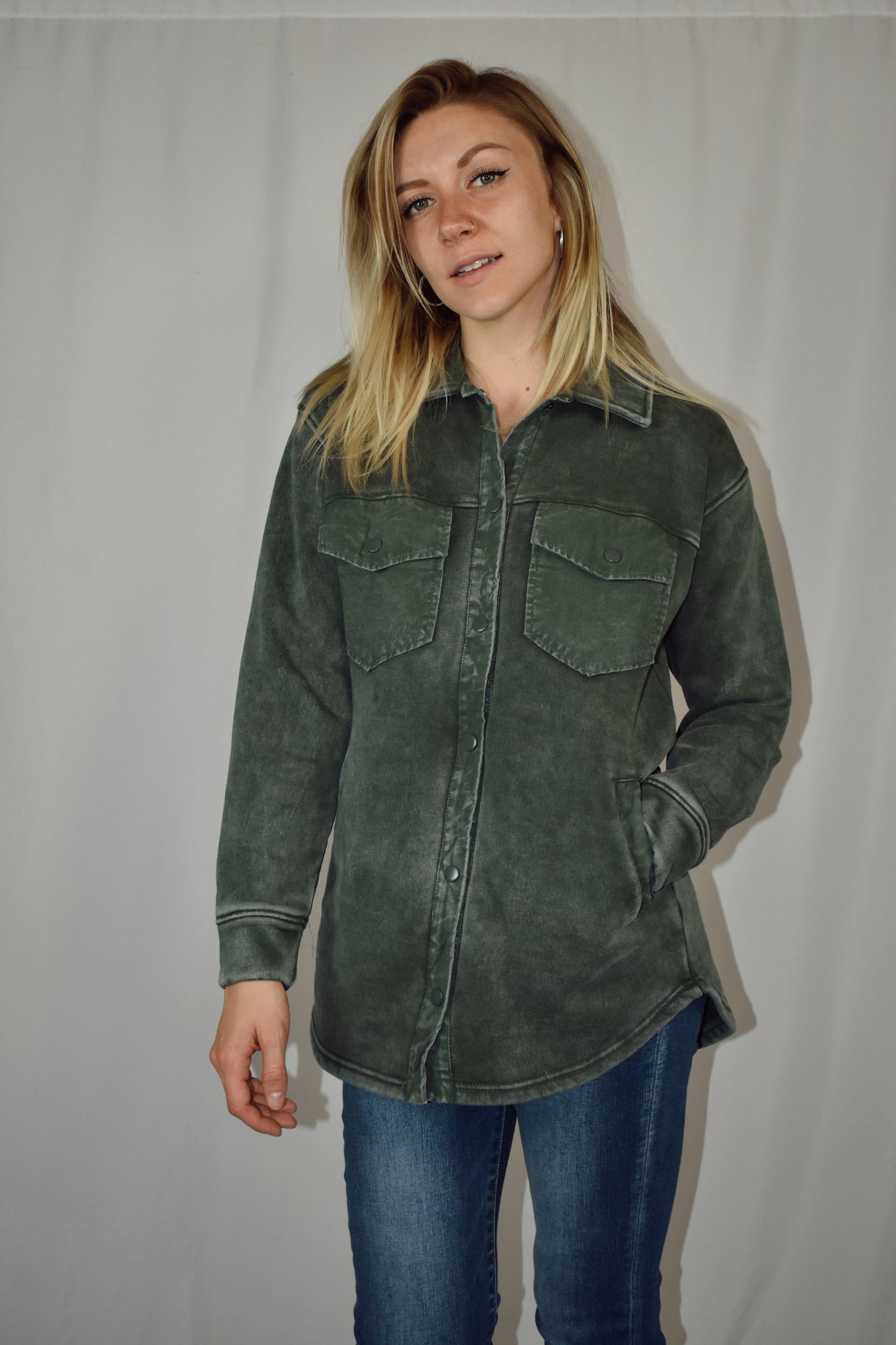 snap button down cozy shacket with two breast pockets, longline silhouette and slightly oversized fit.