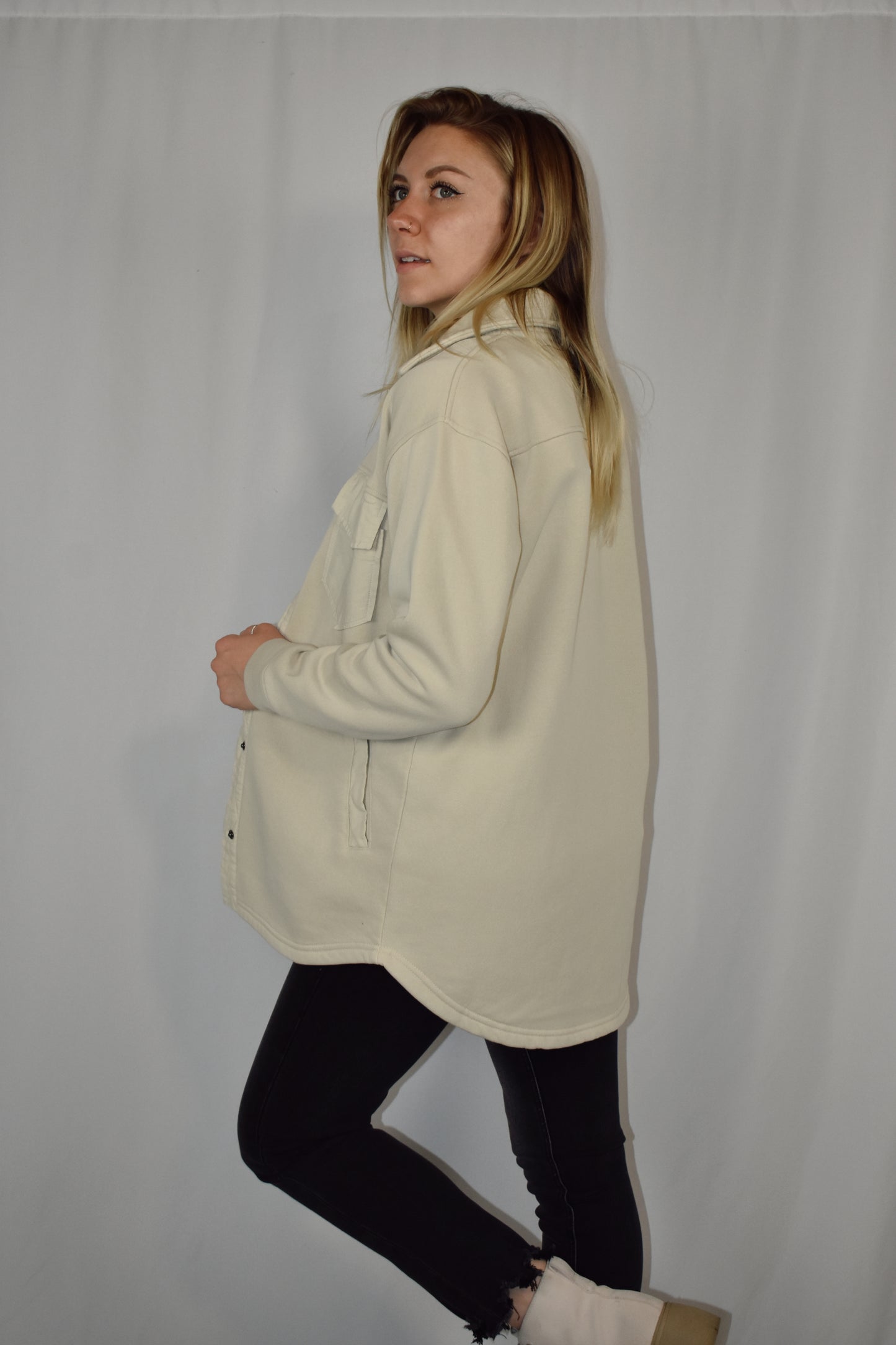 snap button down cozy shacket with two breast pockets, longline silhouette and slightly oversized fit.