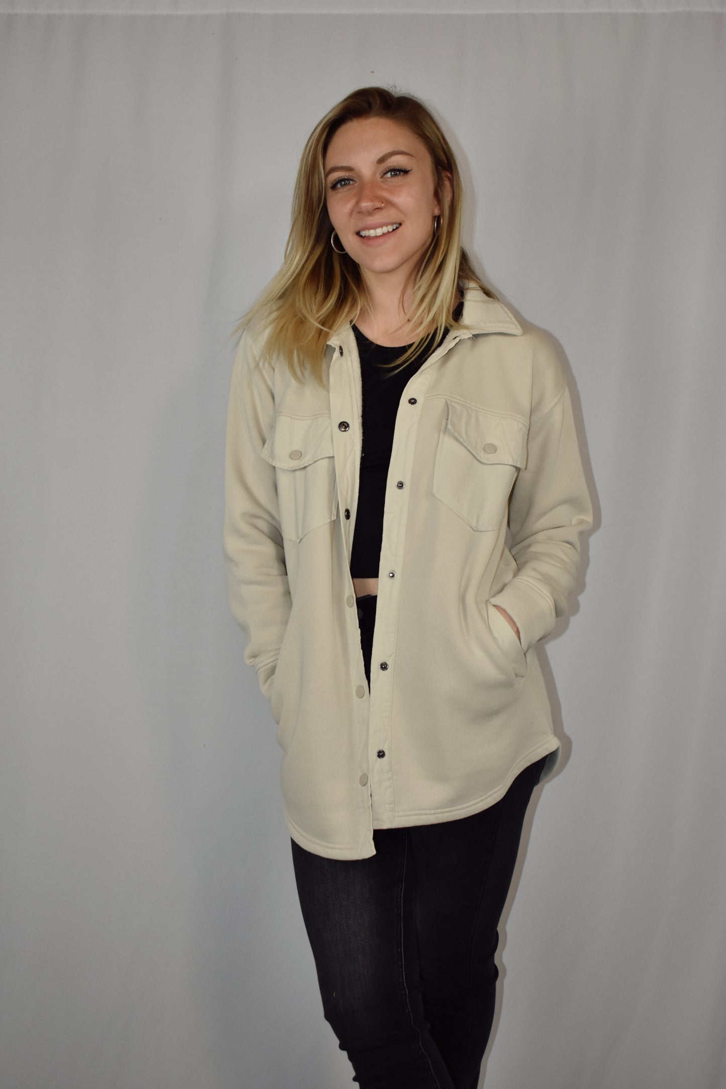 snap button down cozy shacket with two breast pockets, longline silhouette and slightly oversized fit.