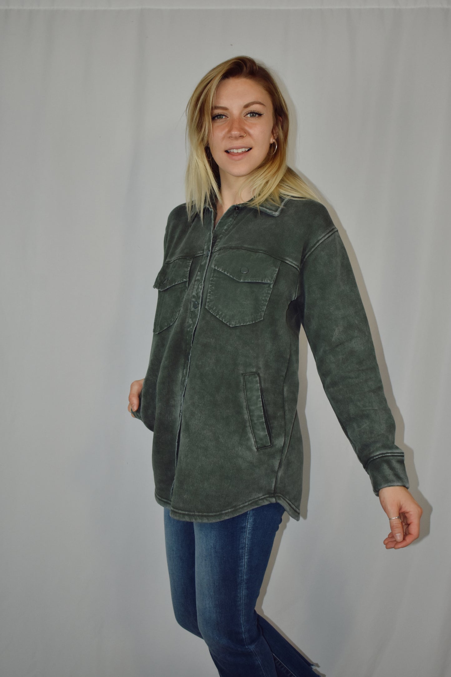 snap button down cozy shacket with two breast pockets, longline silhouette and slightly oversized fit.