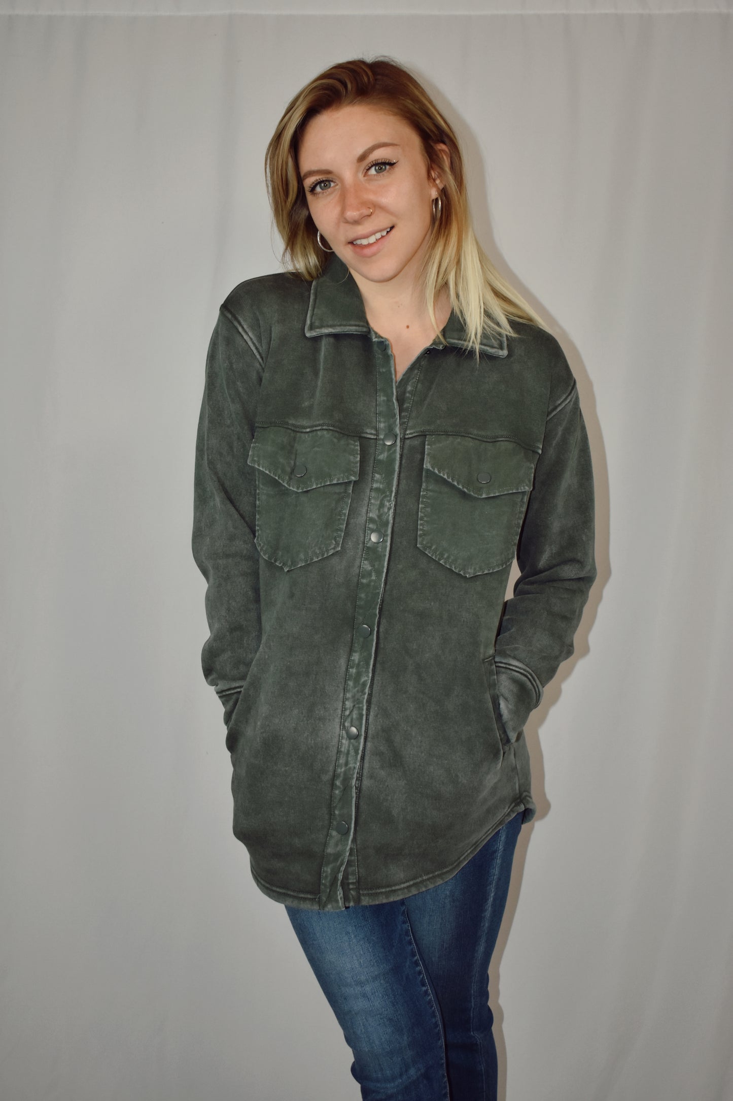 snap button down cozy shacket with two breast pockets, longline silhouette and slightly oversized fit.
