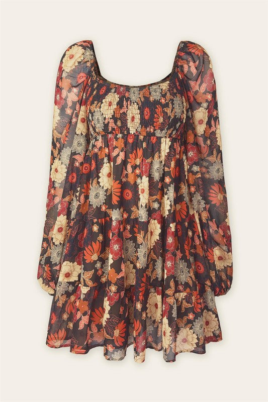 autumn colored floral swing mini dress with tiered skirt and smocked bust with a square neckline thats mirrored on the back with bubble puff sheer long sleeves with elastic synching at wrist