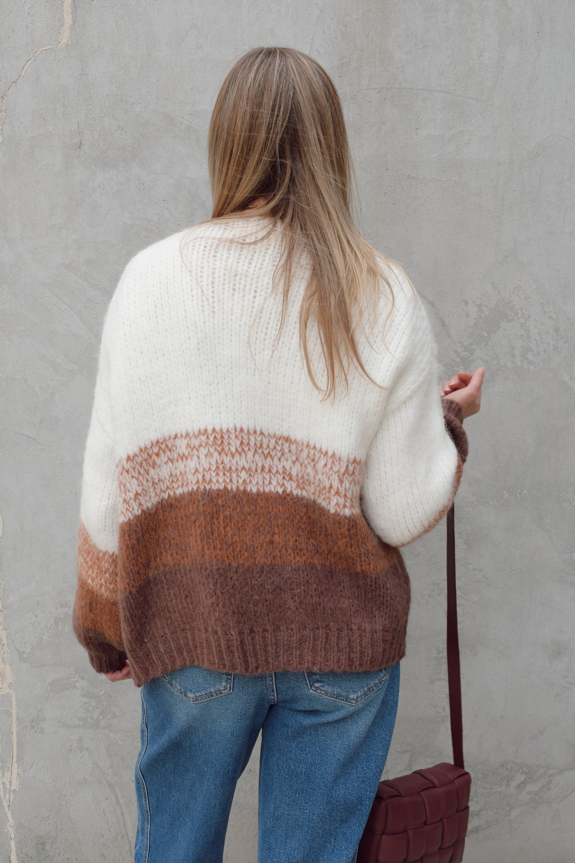 cozy relaxed fit cardigan with bottom half color blocked with earthy tones, white on top drop shoulder ribbed hem full length