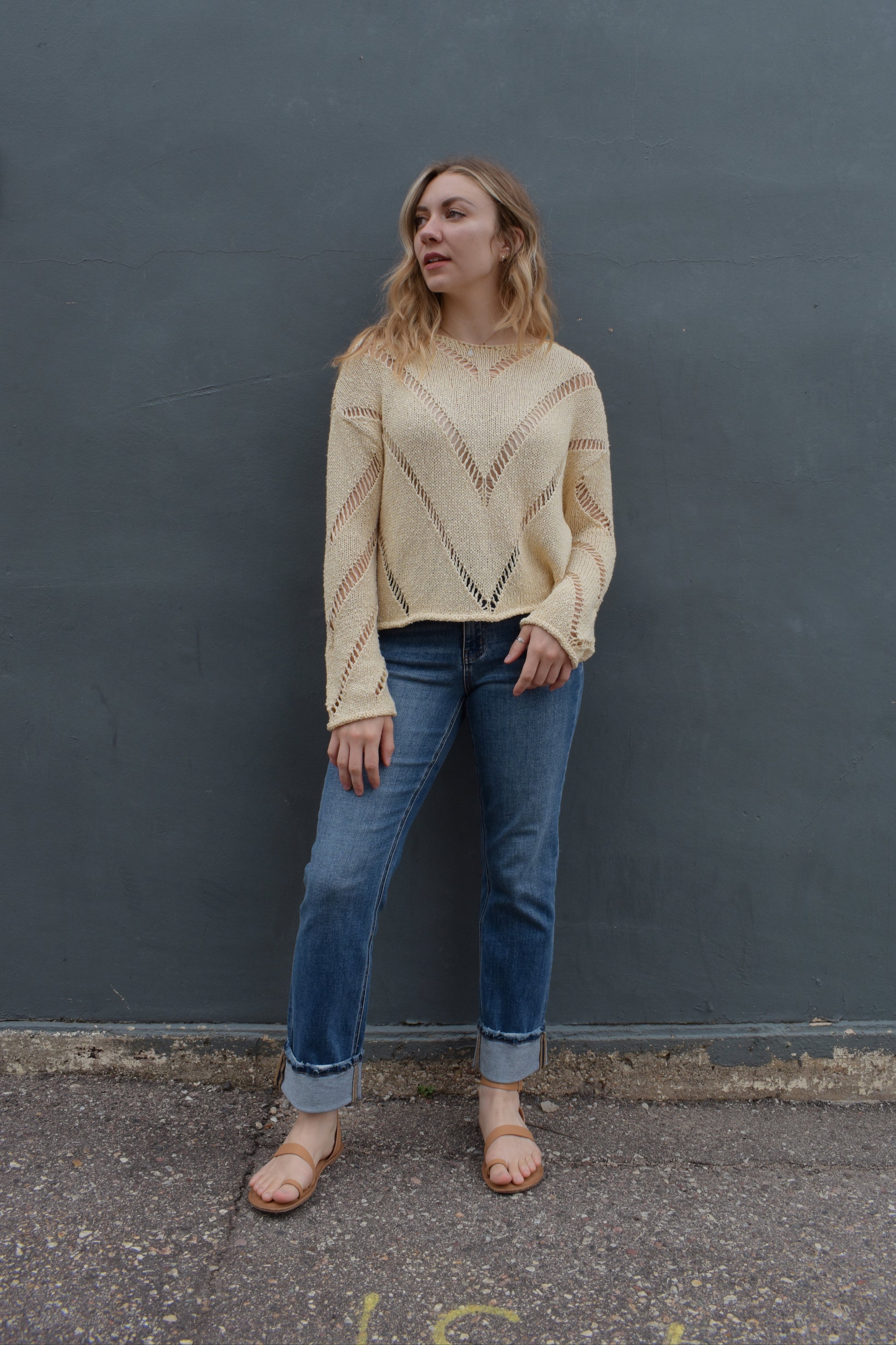 stretch denim straight jeans with cuff that isn't sewn in, zip and button enclosure, no holes, medium wash