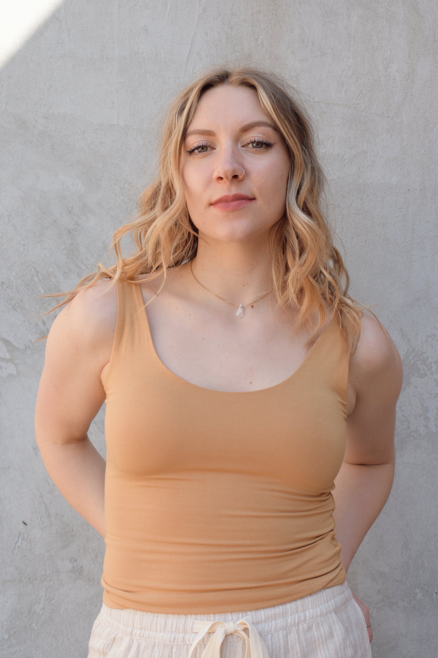 double layered super soft tank top full length fitted scoop neck and scoop back staple piece