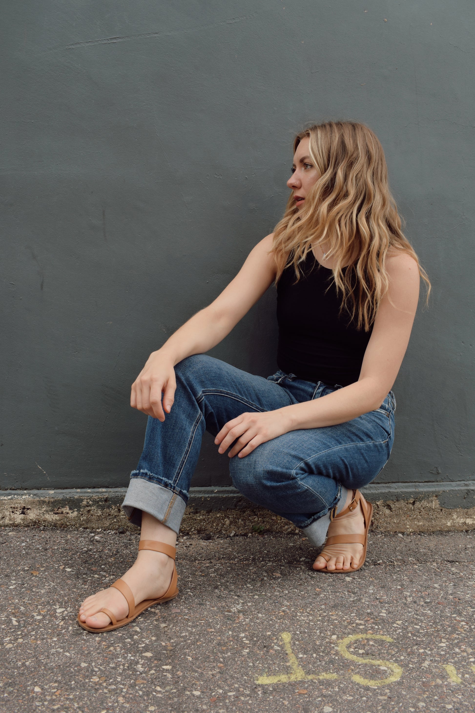 stretch denim straight jeans with cuff that isn't sewn in, zip and button enclosure, no holes, medium wash