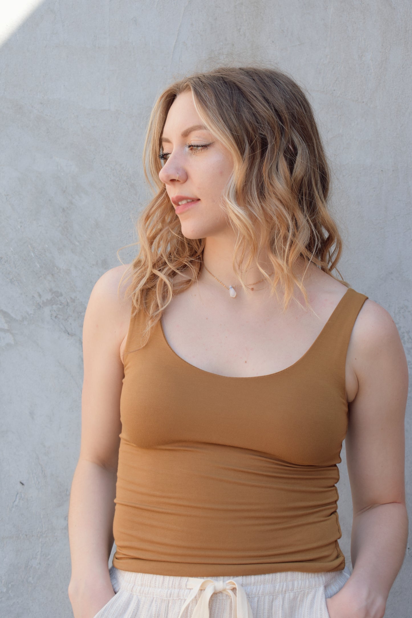 double layered super soft tank top full length fitted scoop neck and scoop back staple piece