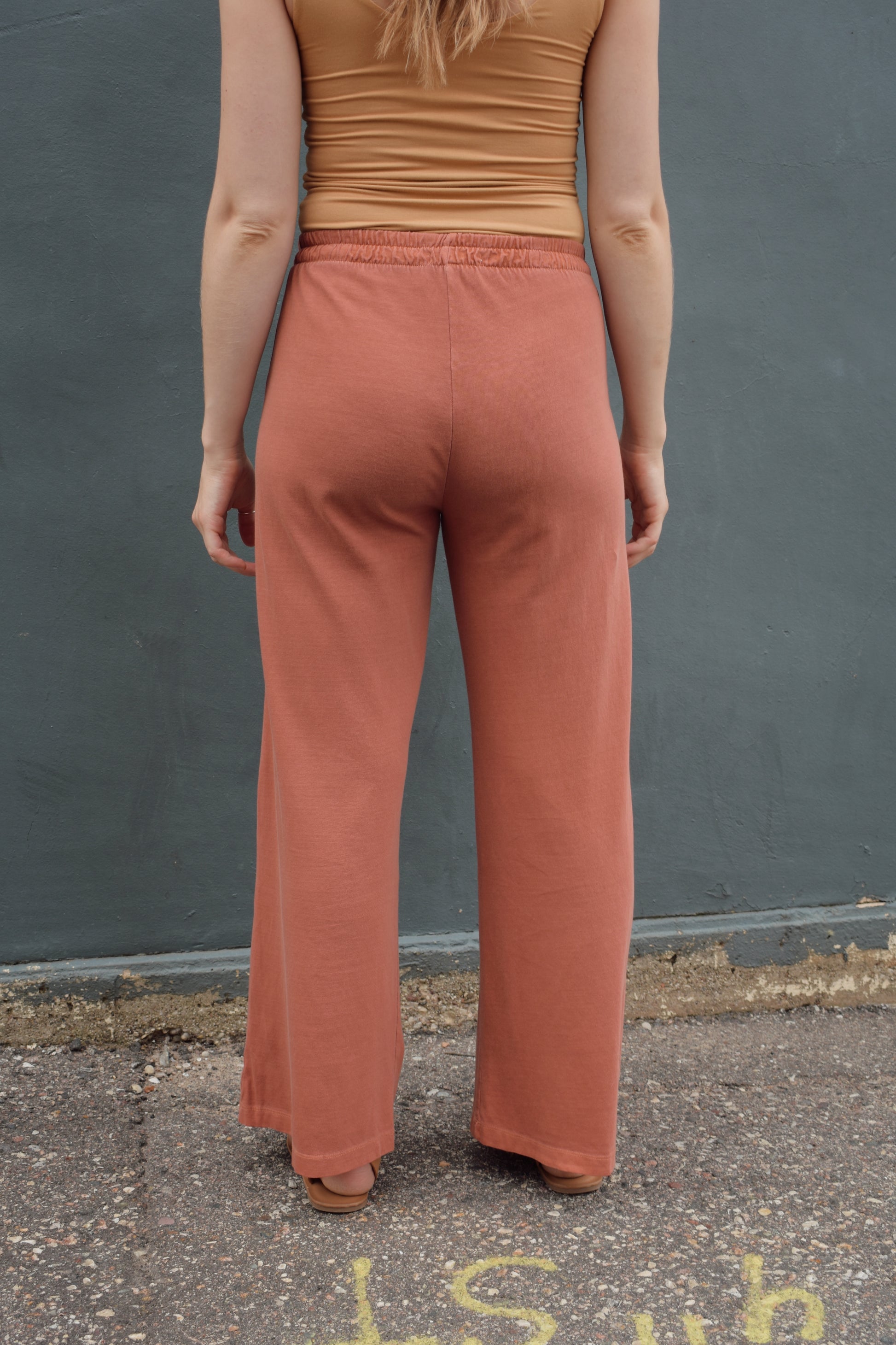 wide leg lounge pants high waist elastic waistband no pockets full length rust color