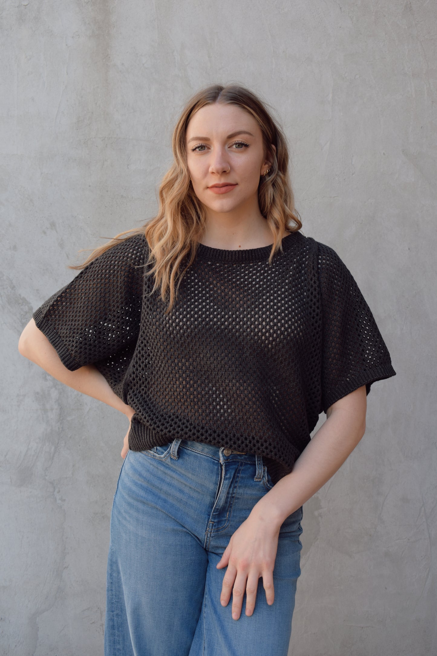 dark charcoal net dolman top with open knit design boxy fit full length bat wing vibes short sleeve scoop neck