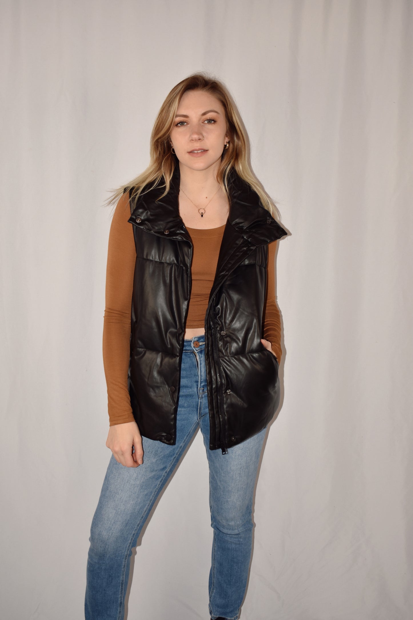 oversized full length faux puffer vest with size pockets, zip front with snaps