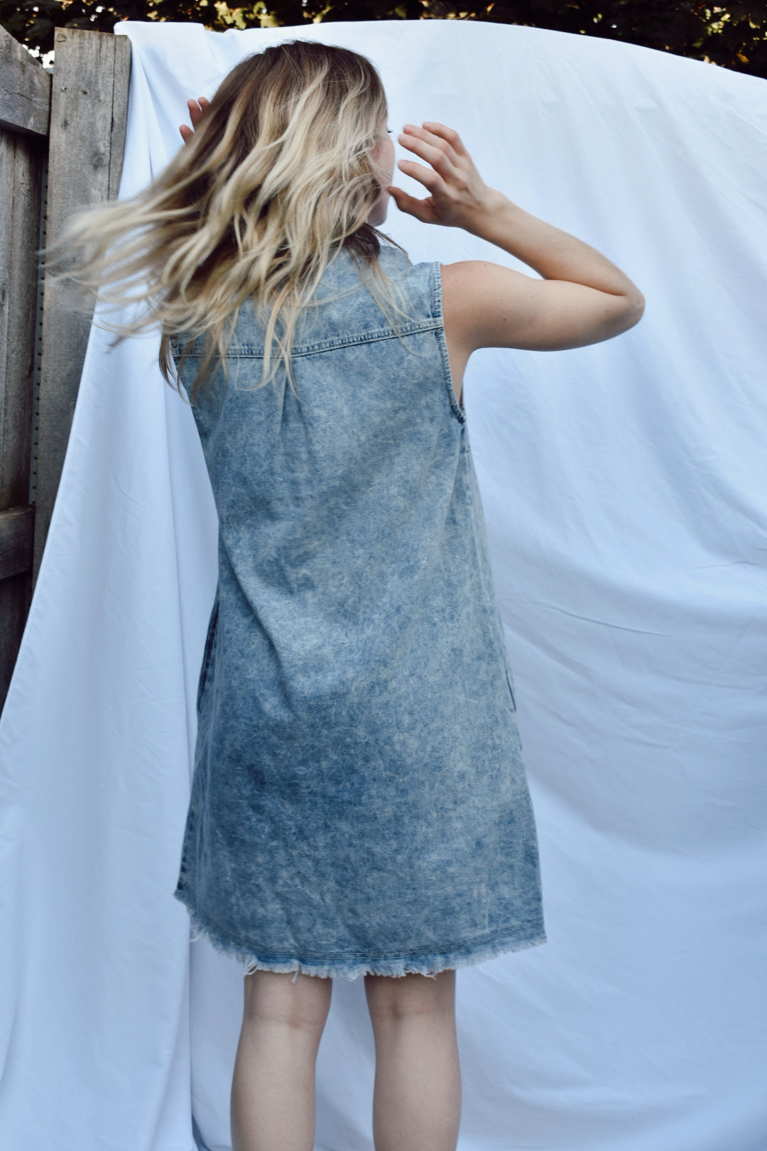 acid wash denim and raw edge frayed hem mini dress button down collar with pockets Bluivy the revival