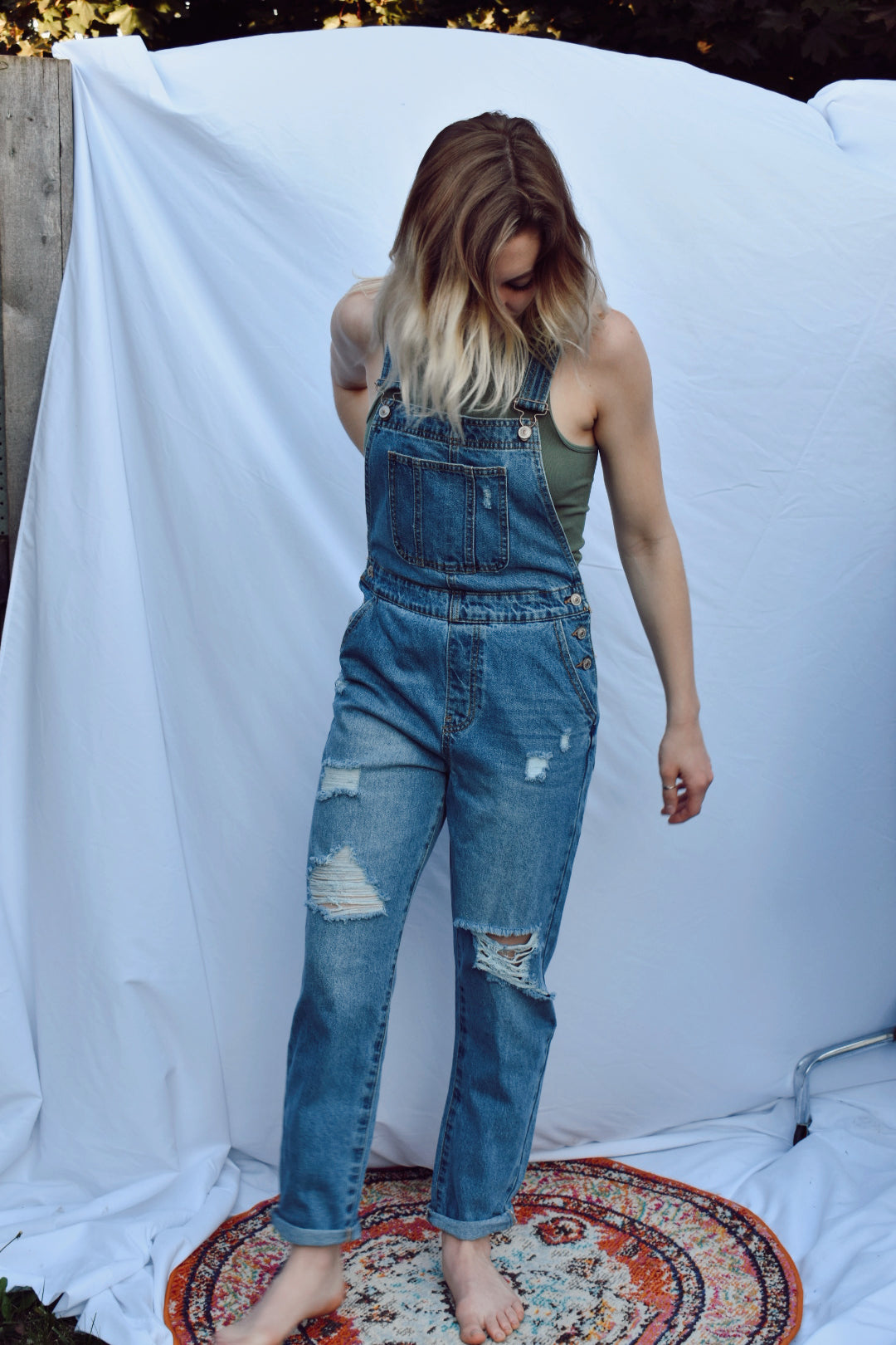 light denim overalls cuffed and distressed front pocket sinched waist 2sable the revival