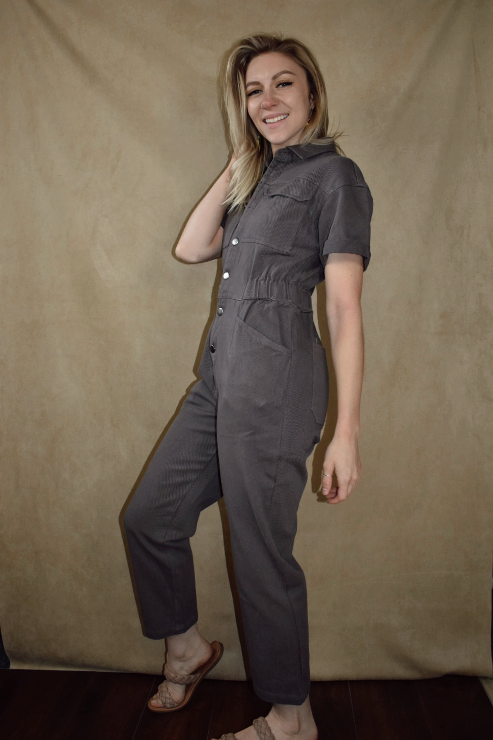 Short sleeve button down engineer style jumpsuit with pockets and elastic waistband Listicle the revival