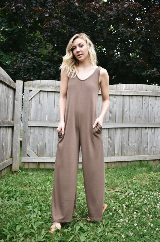 scoop neck tank jumpsuit in mocha with wide legs and pockets. Made with french terry knit fabric and is loose fitting. The brand is Mittoshop.