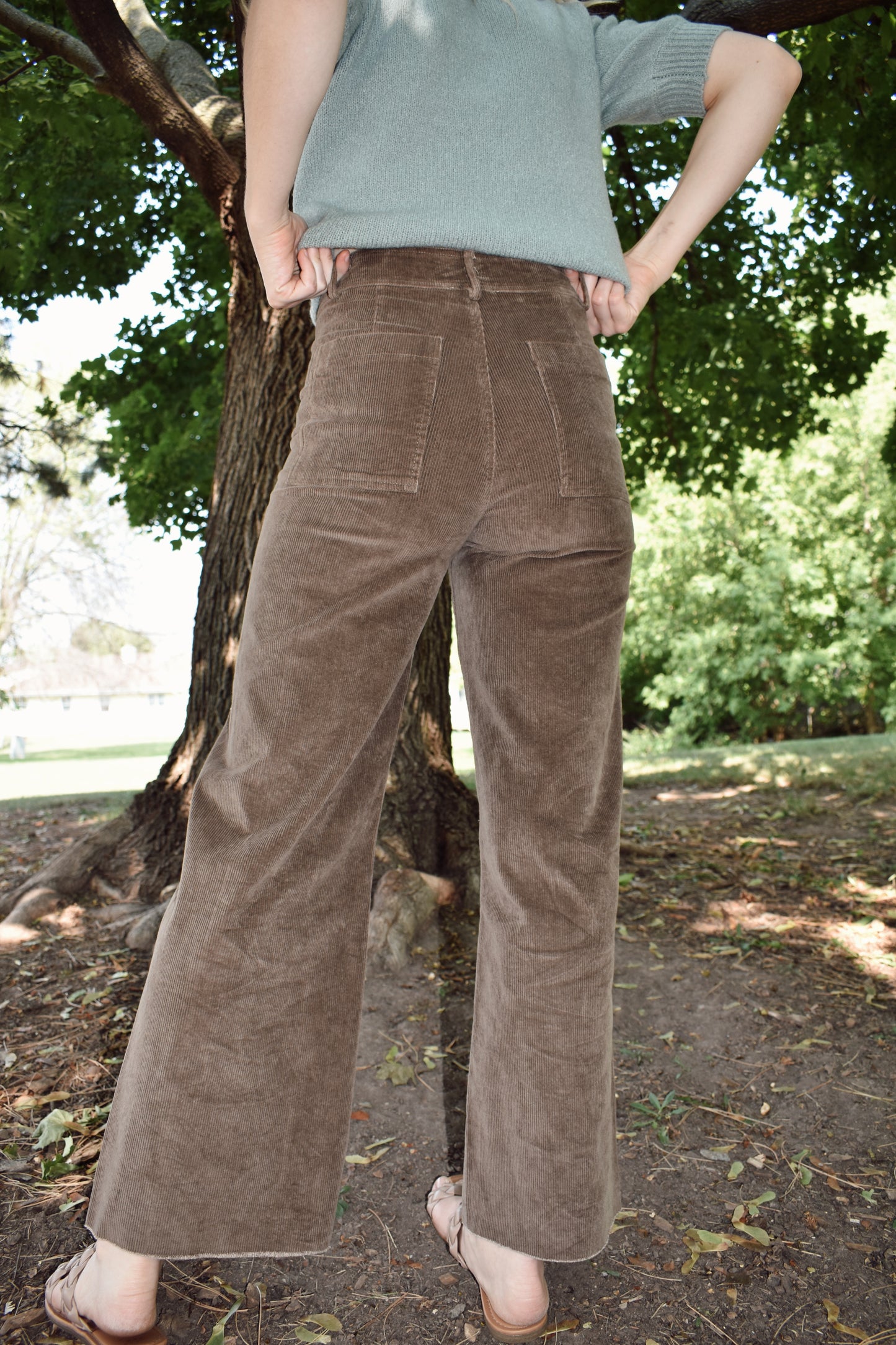 High waisted brown corduroy pants wide leg slim fit front zip and button closure