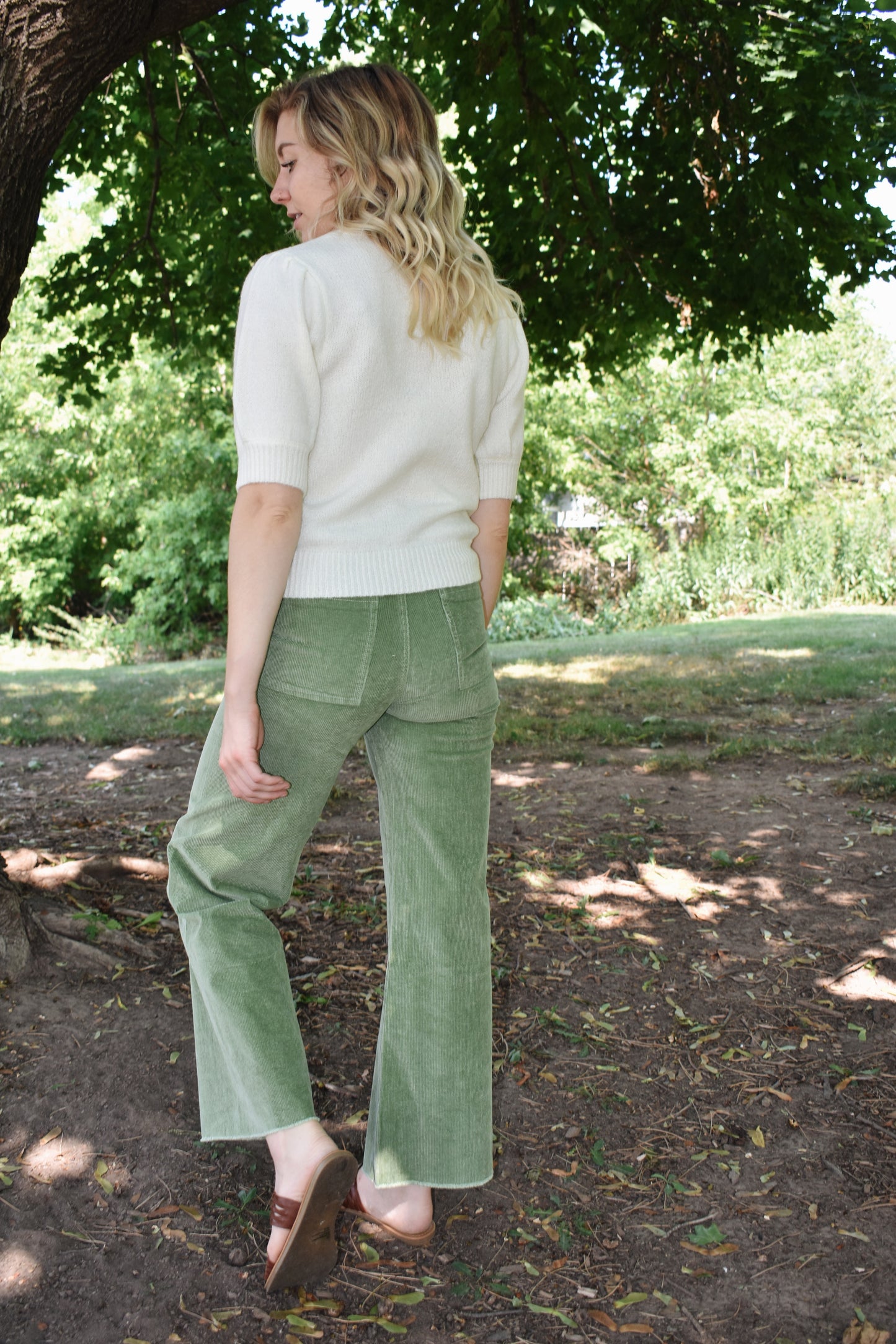 High waisted leaf green corduroy pants wide leg slim fit front zip and button closure