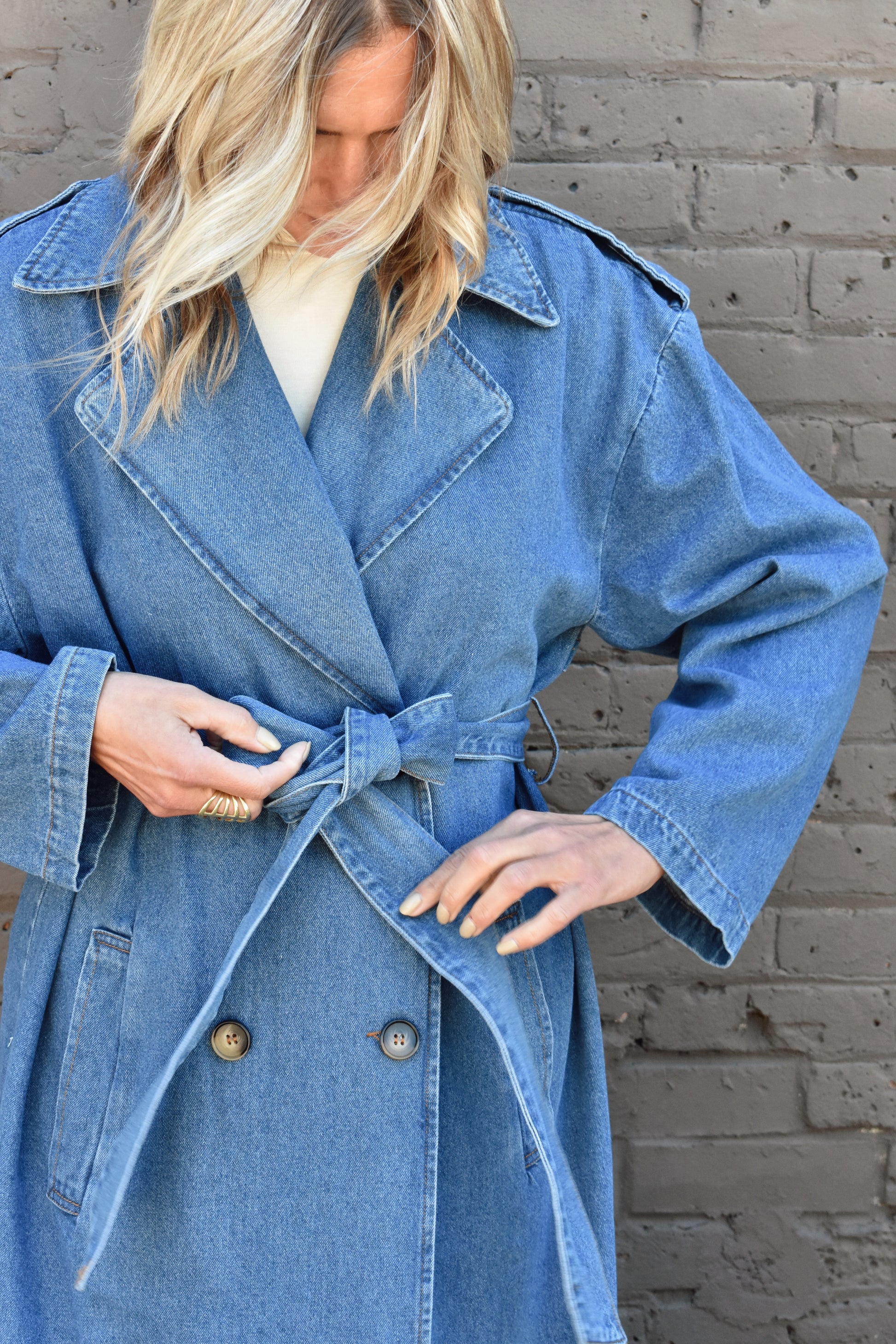 oversized denim trench coat medium wash, double breasted, button front and side pockets, denim tie for waist.