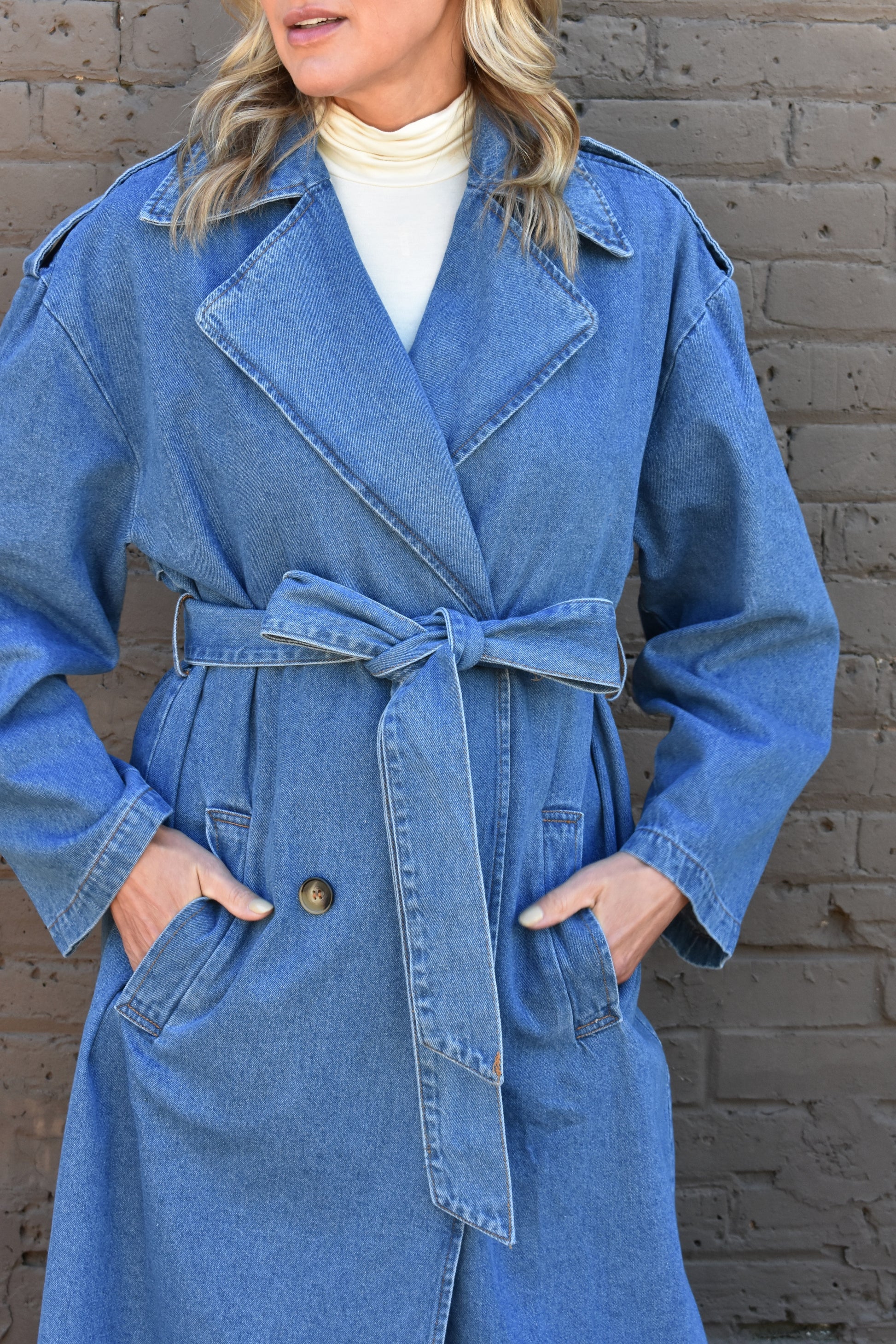 oversized denim trench coat medium wash, double breasted, button front and side pockets, denim tie for waist.