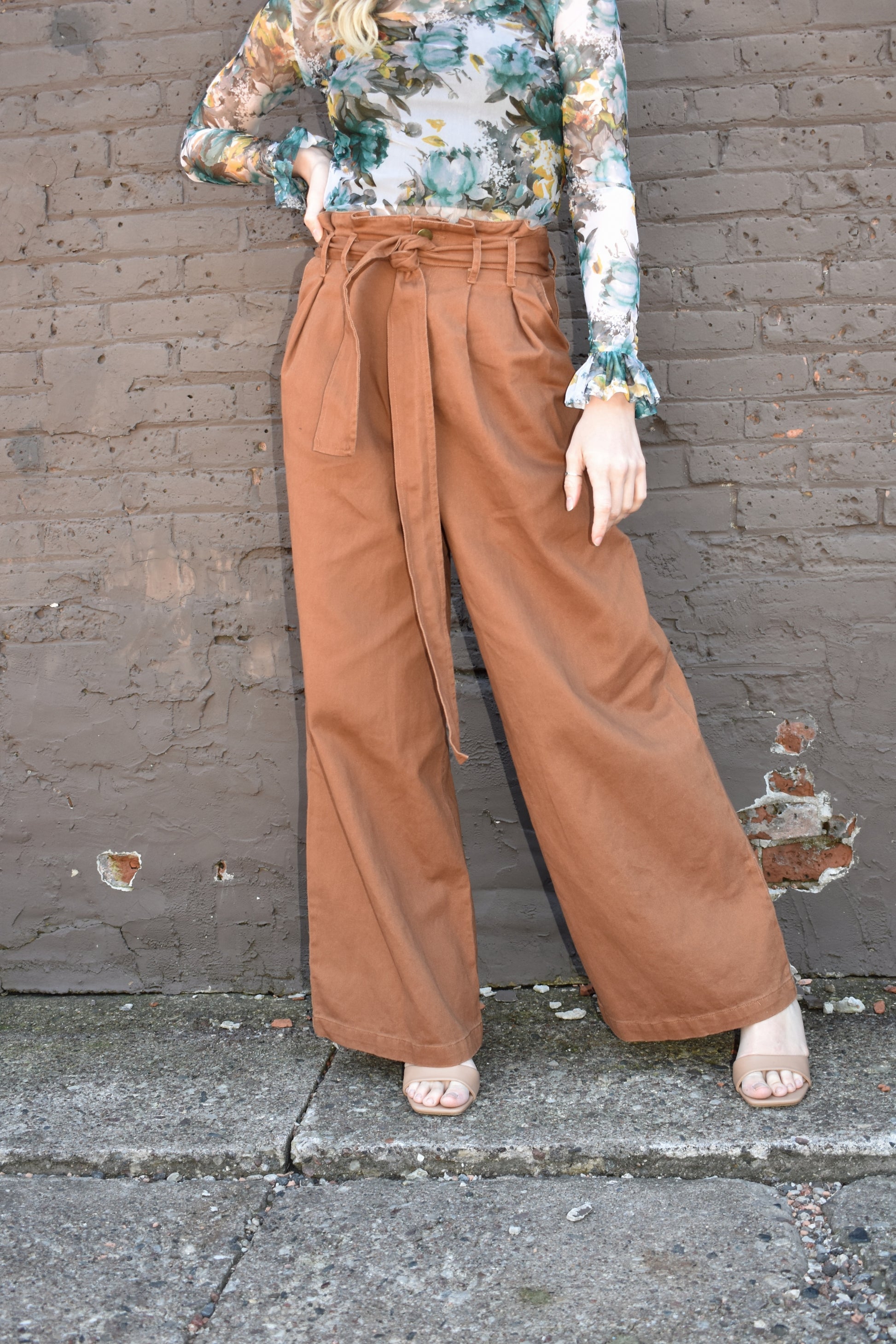 Light brown high waisted twill pants with wide legs, tie belt, side pockets, paper bag style on waistline